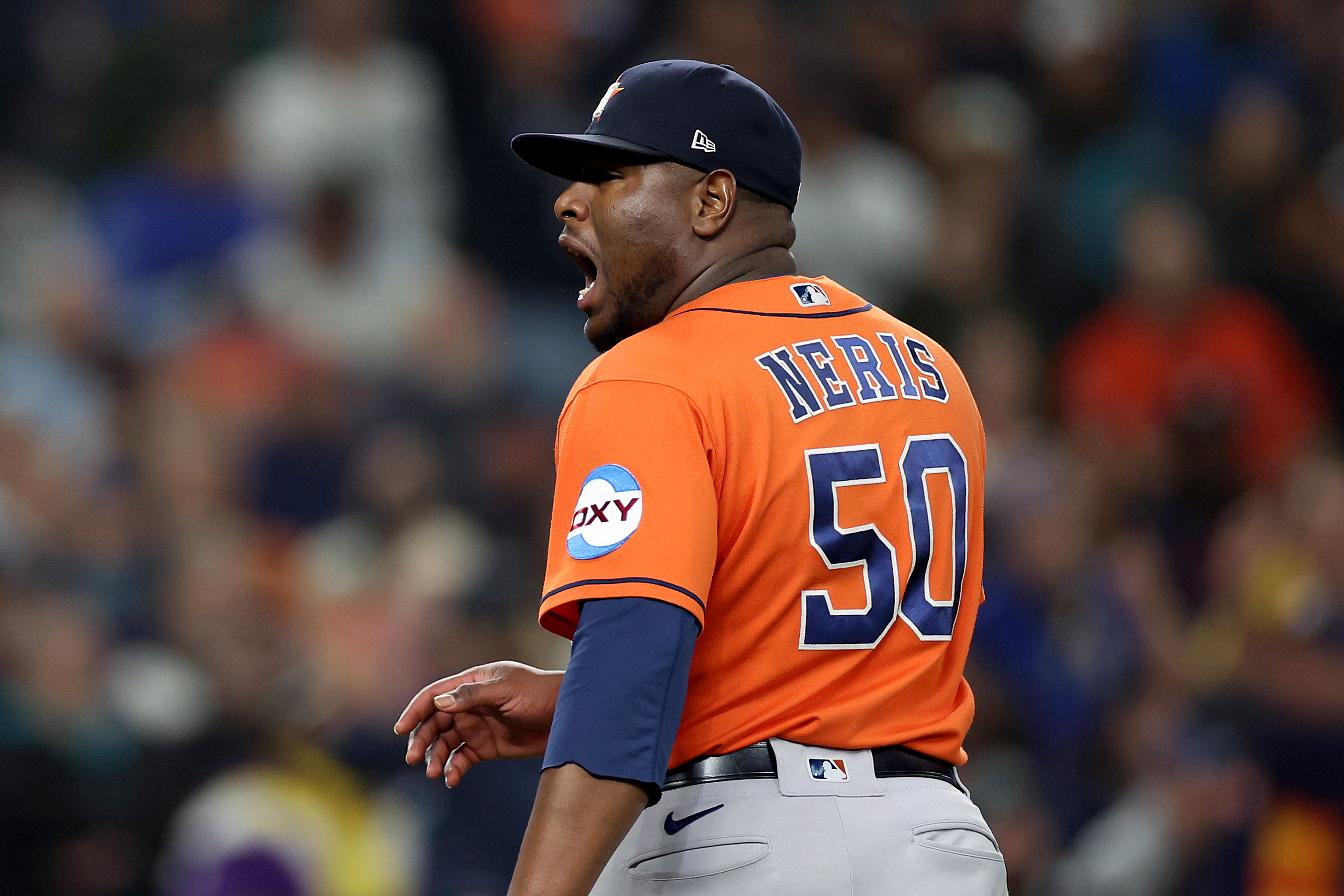 Hector Neris of the Houston Astros reacts after striking out Julio Rodriguez of the Seattle Mariners during the sixth inning at T-Mobile Park on September 27, 2023 in Seattle, Washington.