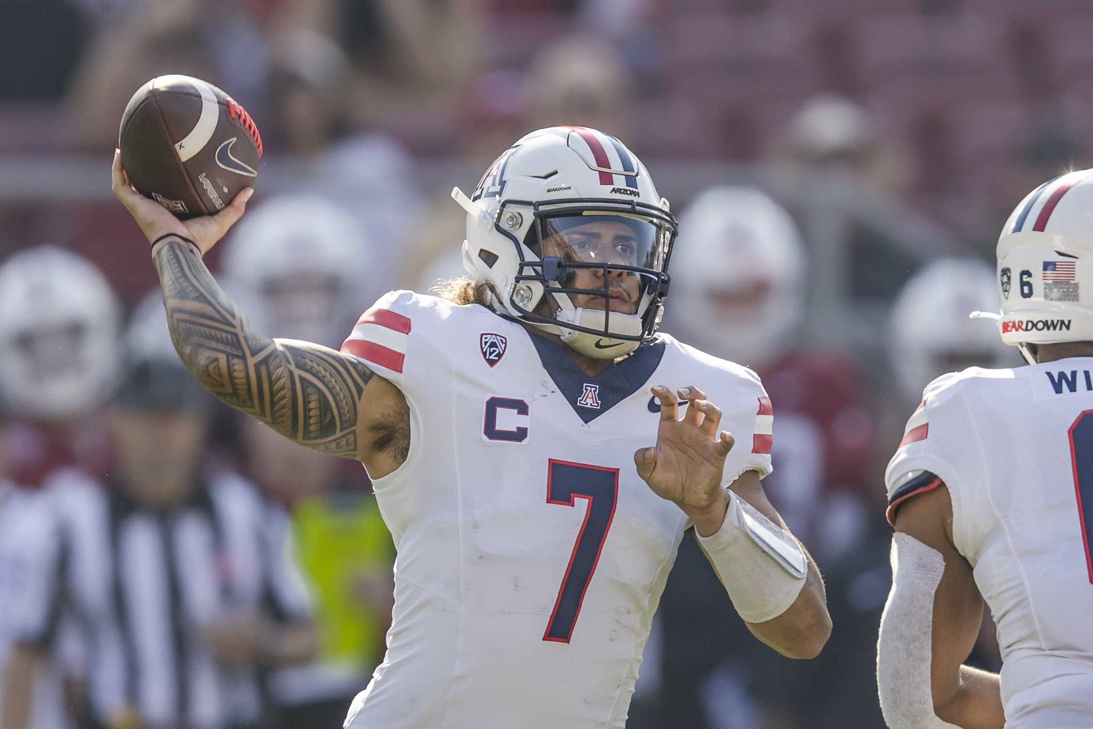 Arizona Wildcats quarterback Jayden de Laura passes against the Stanford Cardinal during the first quarter at Stanford Stadium.