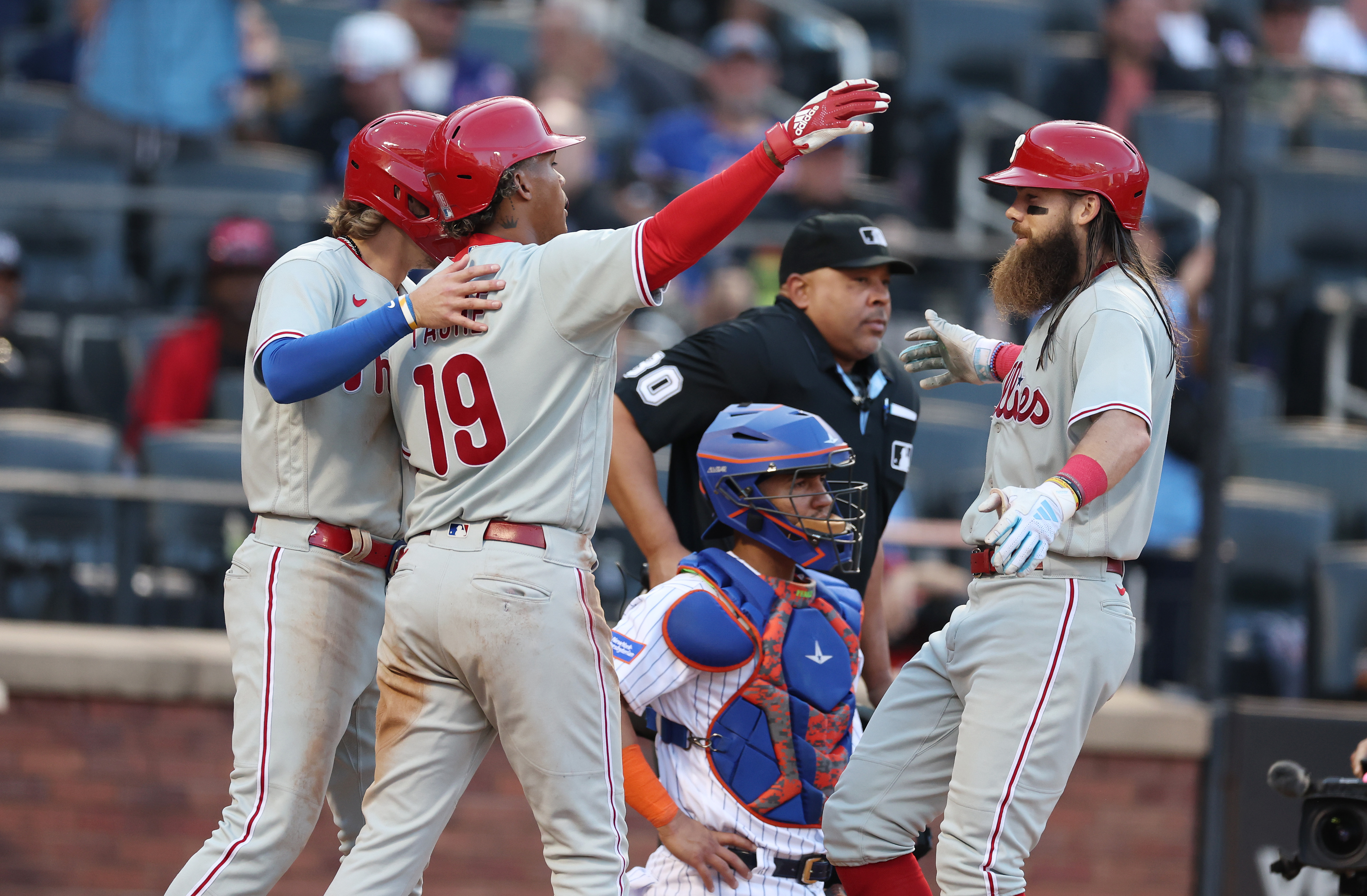 Brandon Marsh of the Philadelphia Phillies celebrates after hitting a three run home run against the New York Mets during the ninth inning of their game at Citi Field on October 01, 2023 in New York City.