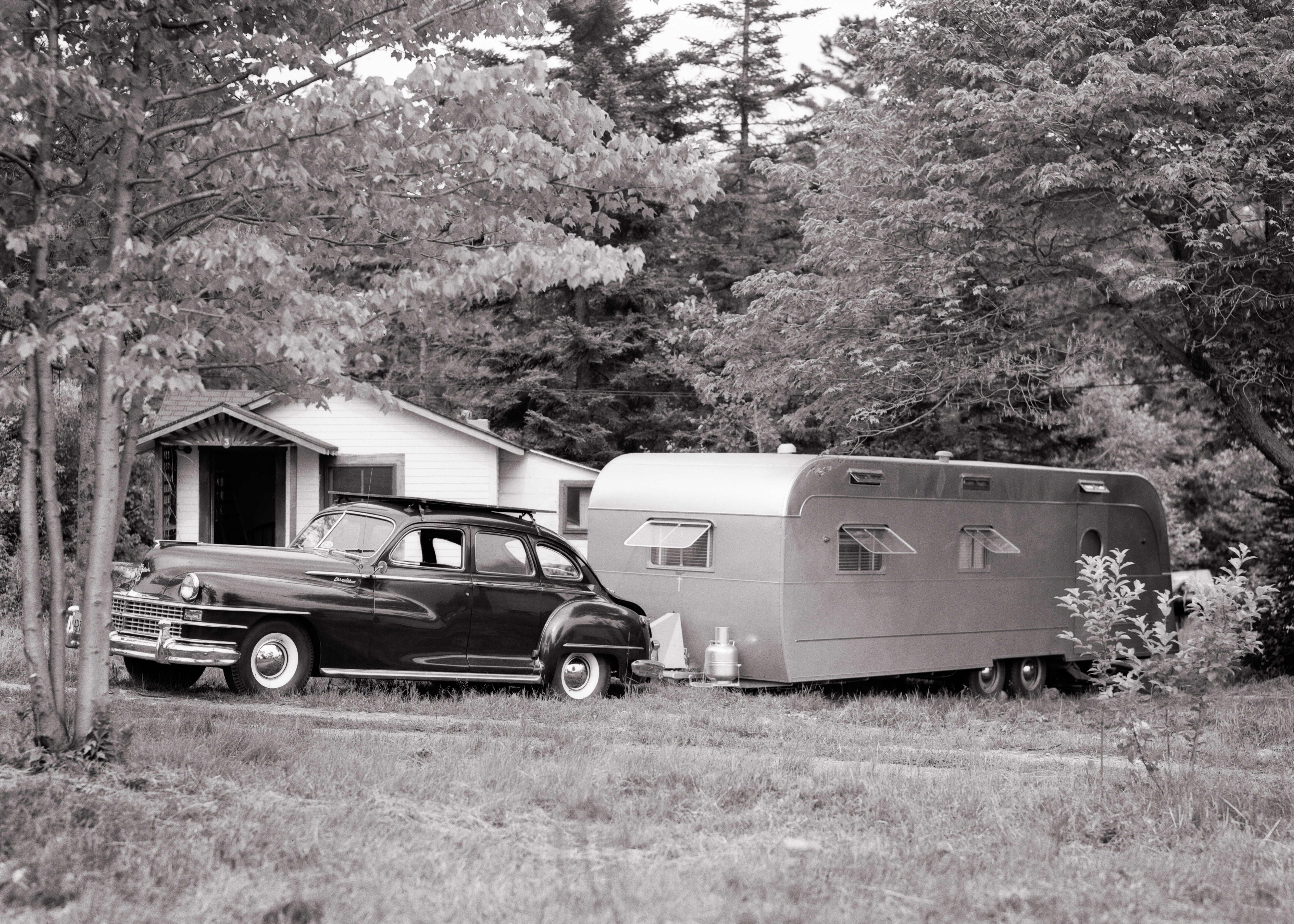 1950s Car Attached To Rv Tr...