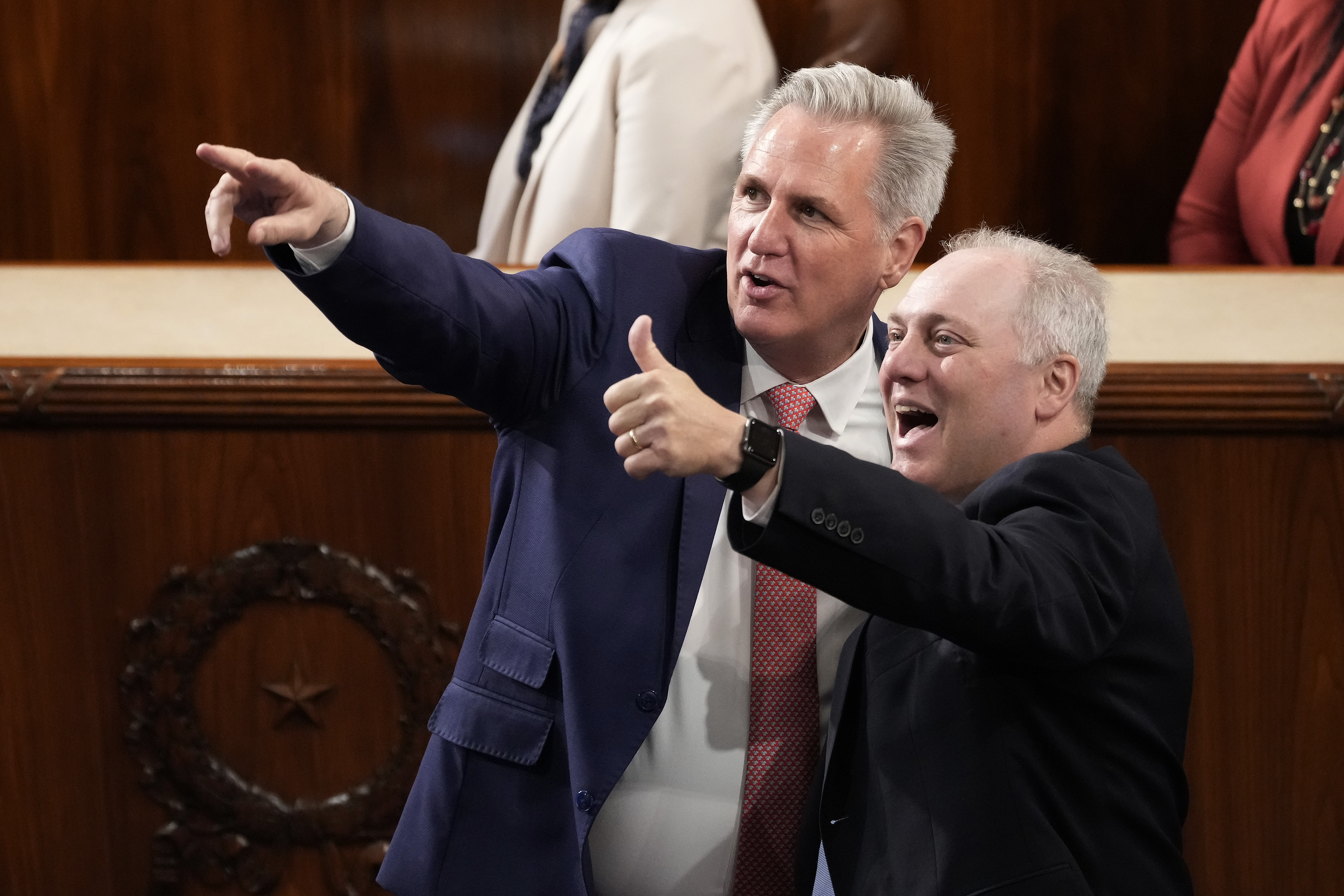 Kevin McCarthy and Steve Scalise point and smile.