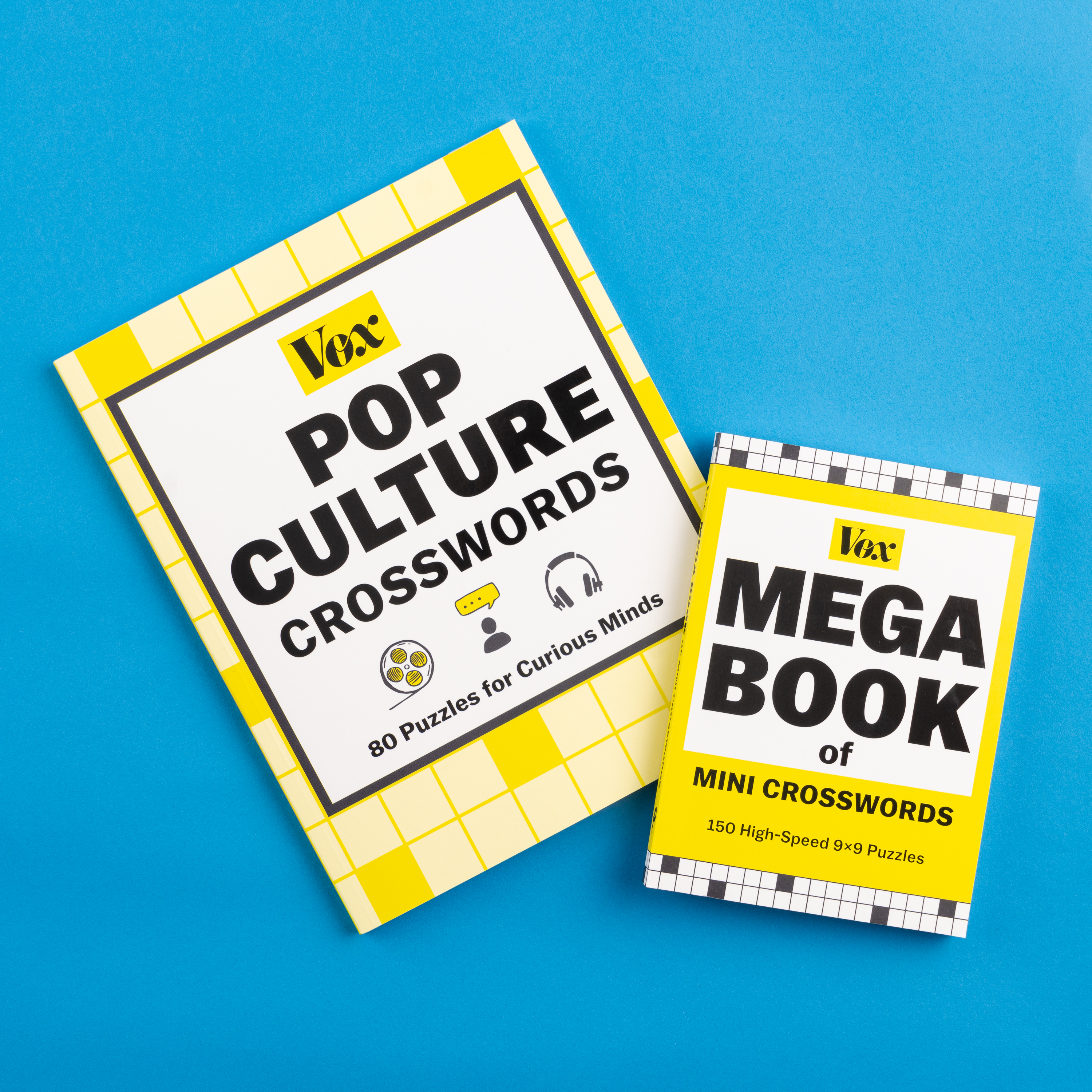 Two crossword books, Vox Pop Culture Crosswords and Vox Mega Book of Mini Crosswords.