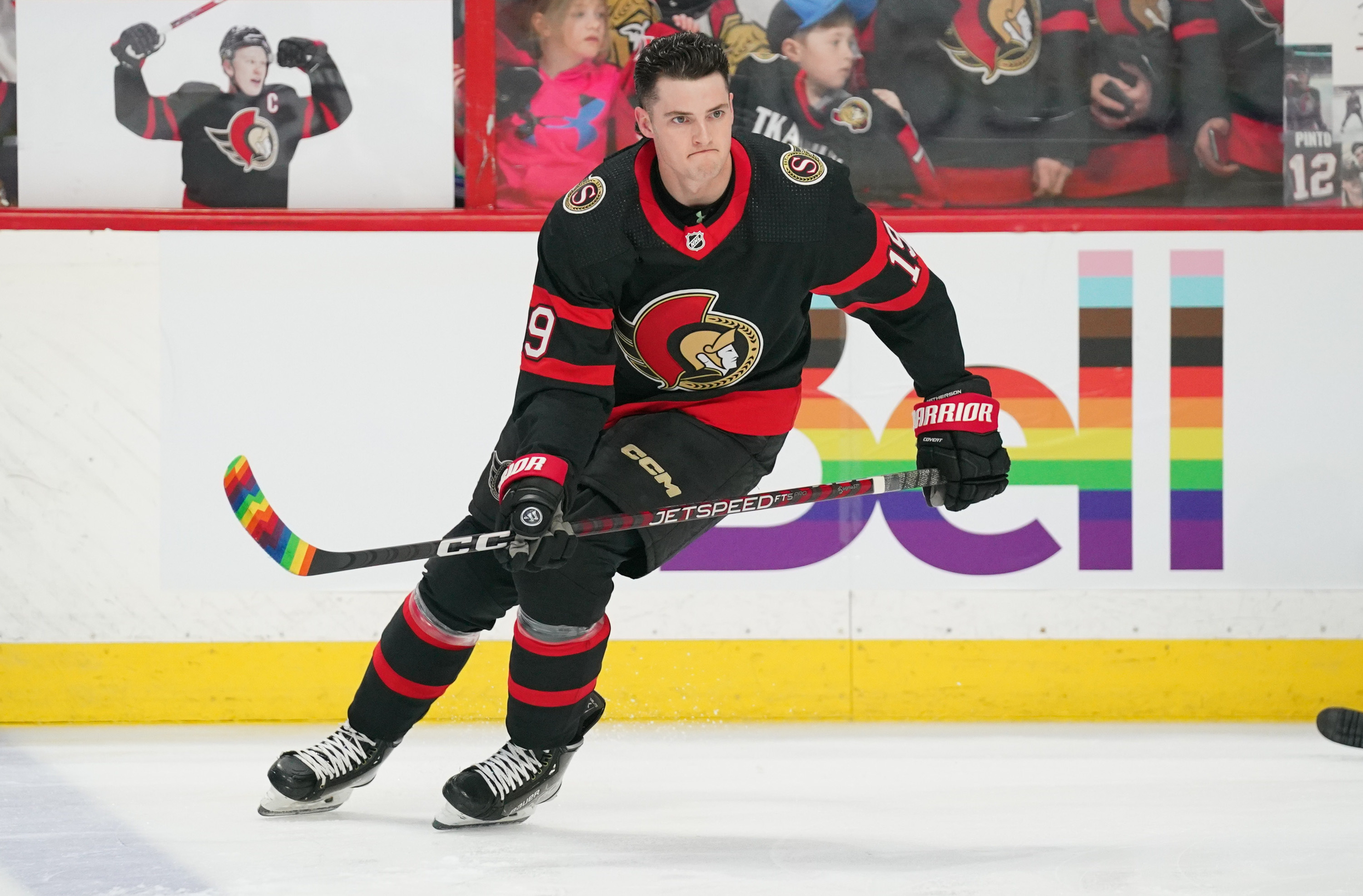 Drake Batherson of the Ottawa Senators warms up with Pride Tape on his stick during warmups on Pride Night on March 4 in Ottawa, Canada.