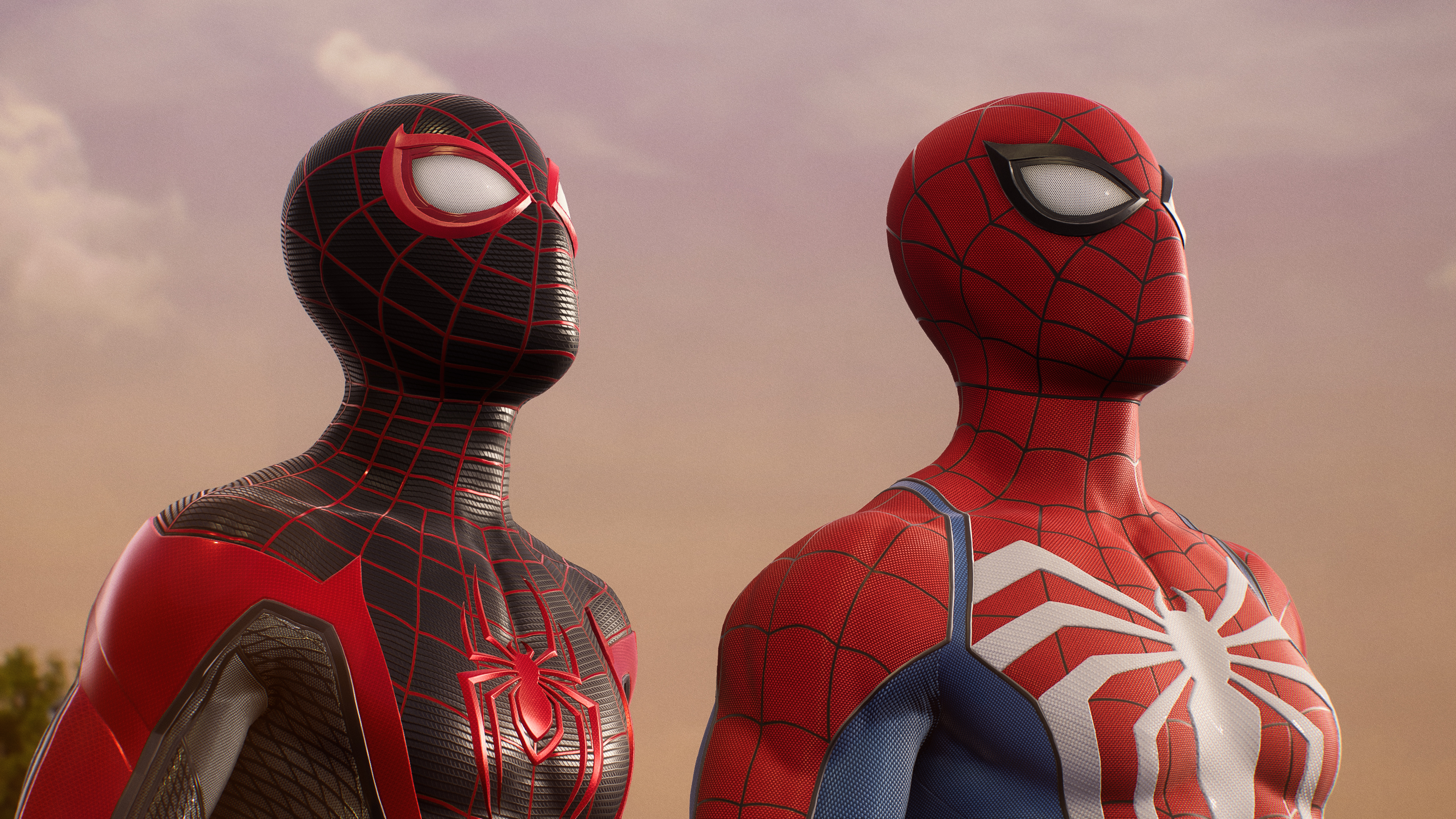 two Spider-Mans — Miles Morales and Peter Parker — looking upward in Spider-Man 2