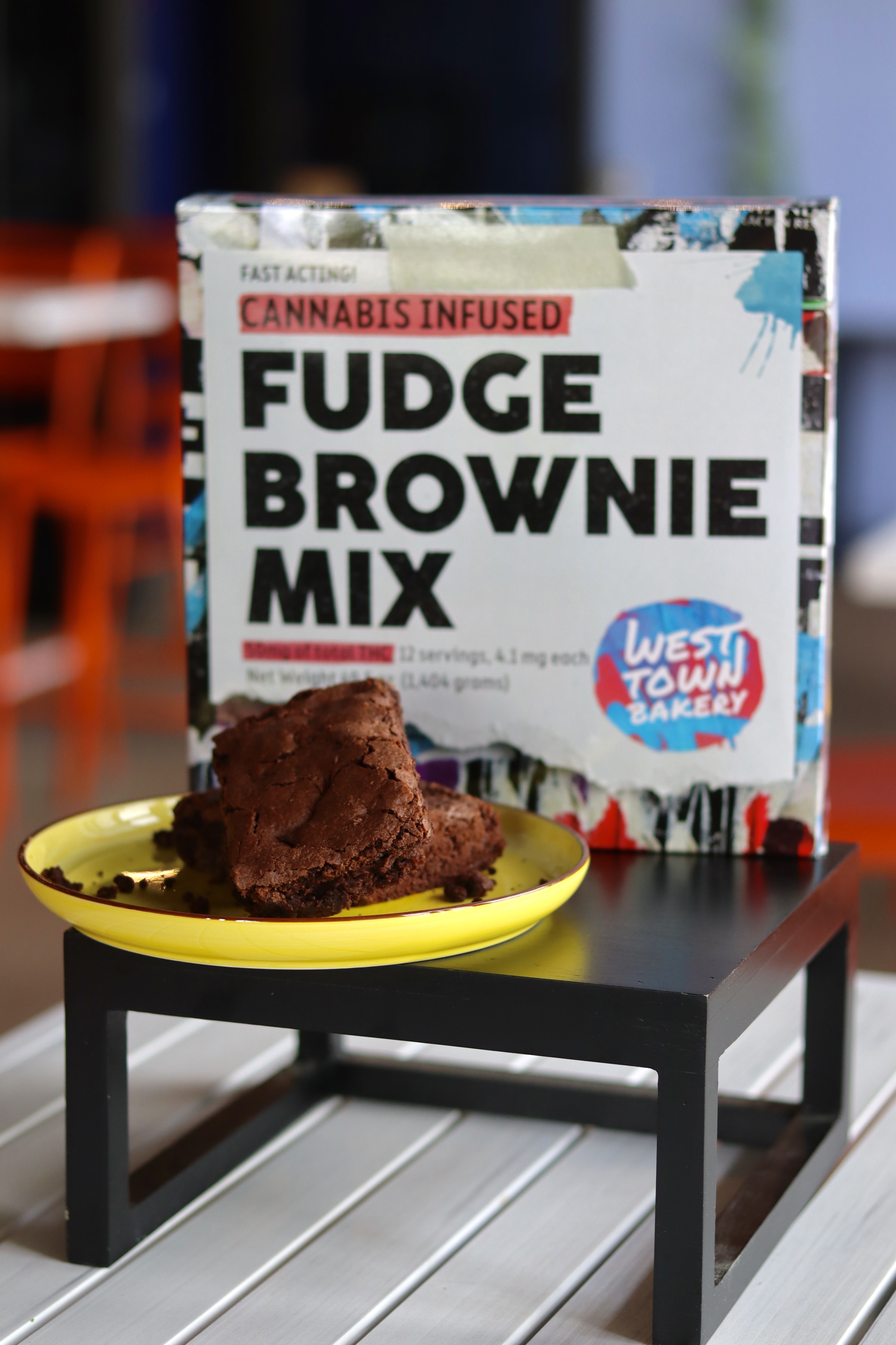 A box of cake mix and plate of brownies.