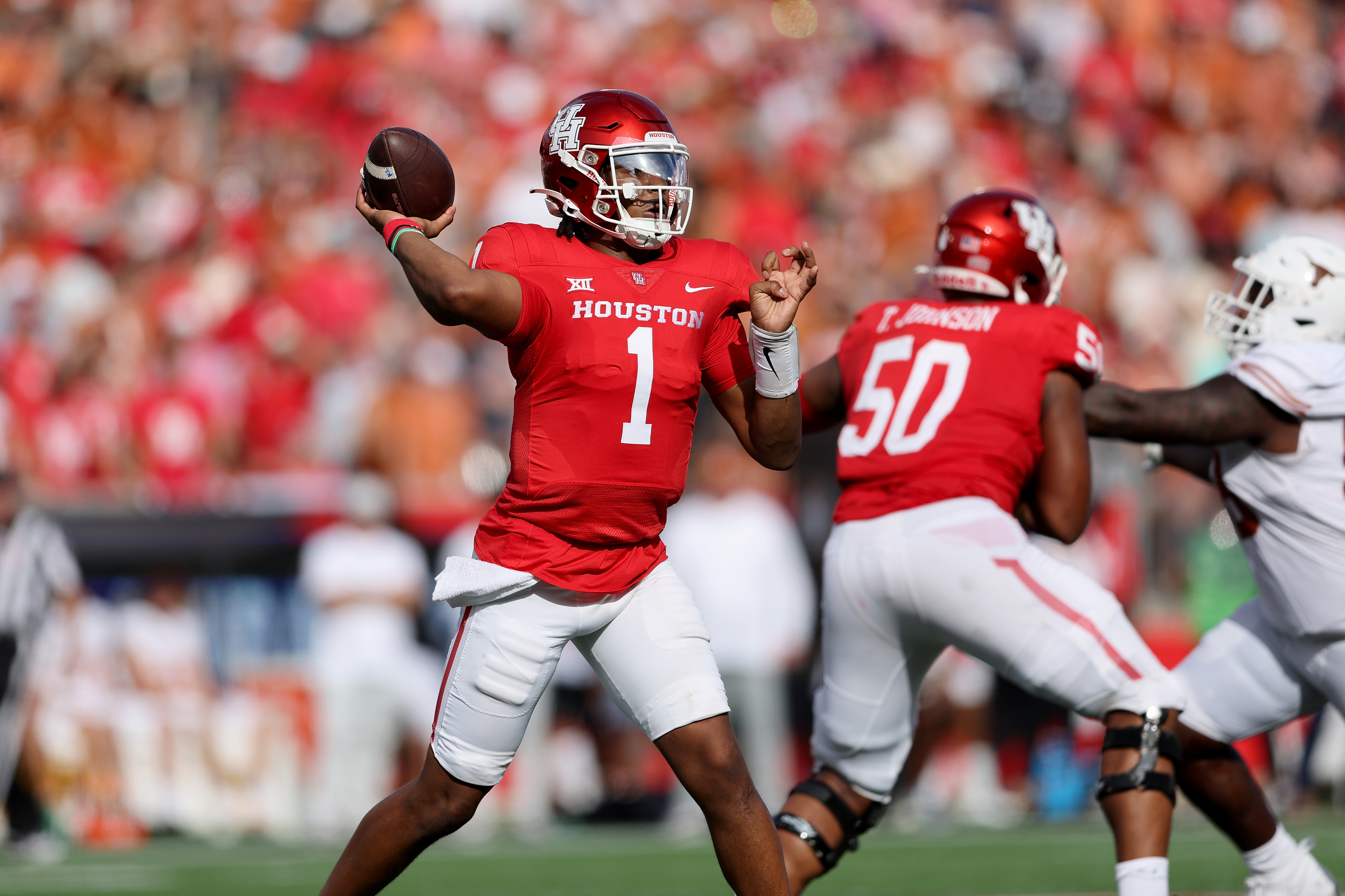 HOUSTON, TEXAS - OCTOBER 21: Donovan Smith #1 of the Houston Cougars throws a pass in the first half against the Texas Longhorns at TDECU Stadium on October 21, 2023 in Houston, Texas.