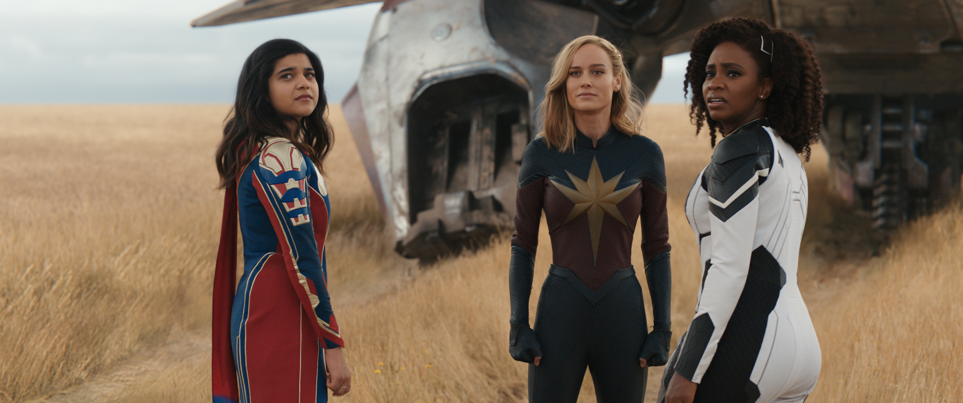 From left to right, Iman Vellani as Ms. Marvel or Kamala Khan, Brie Larson as Captain Marvel or Carol Danvers, and Teyonah Parris as Captain Monica Rambeau, in the movie The Marvels.
