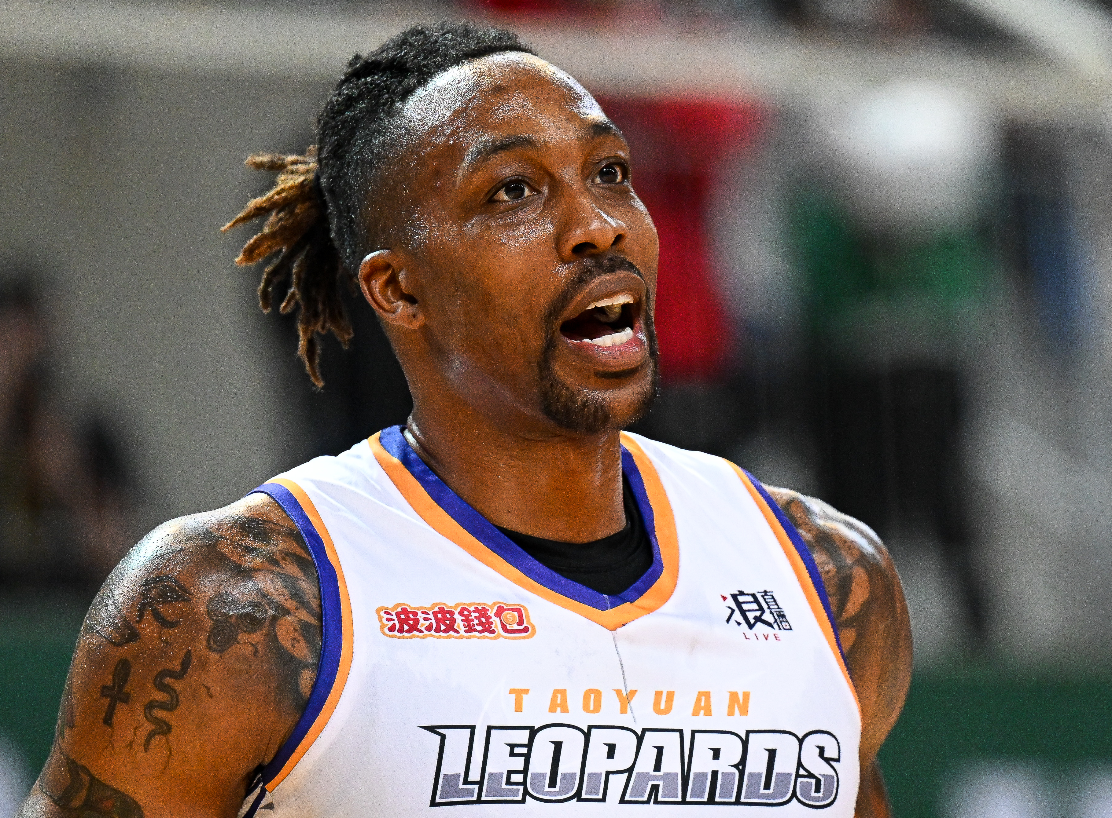 Dwight Howard of the Taoyuan Leopards reacts at the court during the T1 League game between TaiwanBeer HeroBears and Taoyuan Leopards at University of Taipei Tianmu Gymnasium on Feb. 19, 2023 in Taipei, Taiwan.