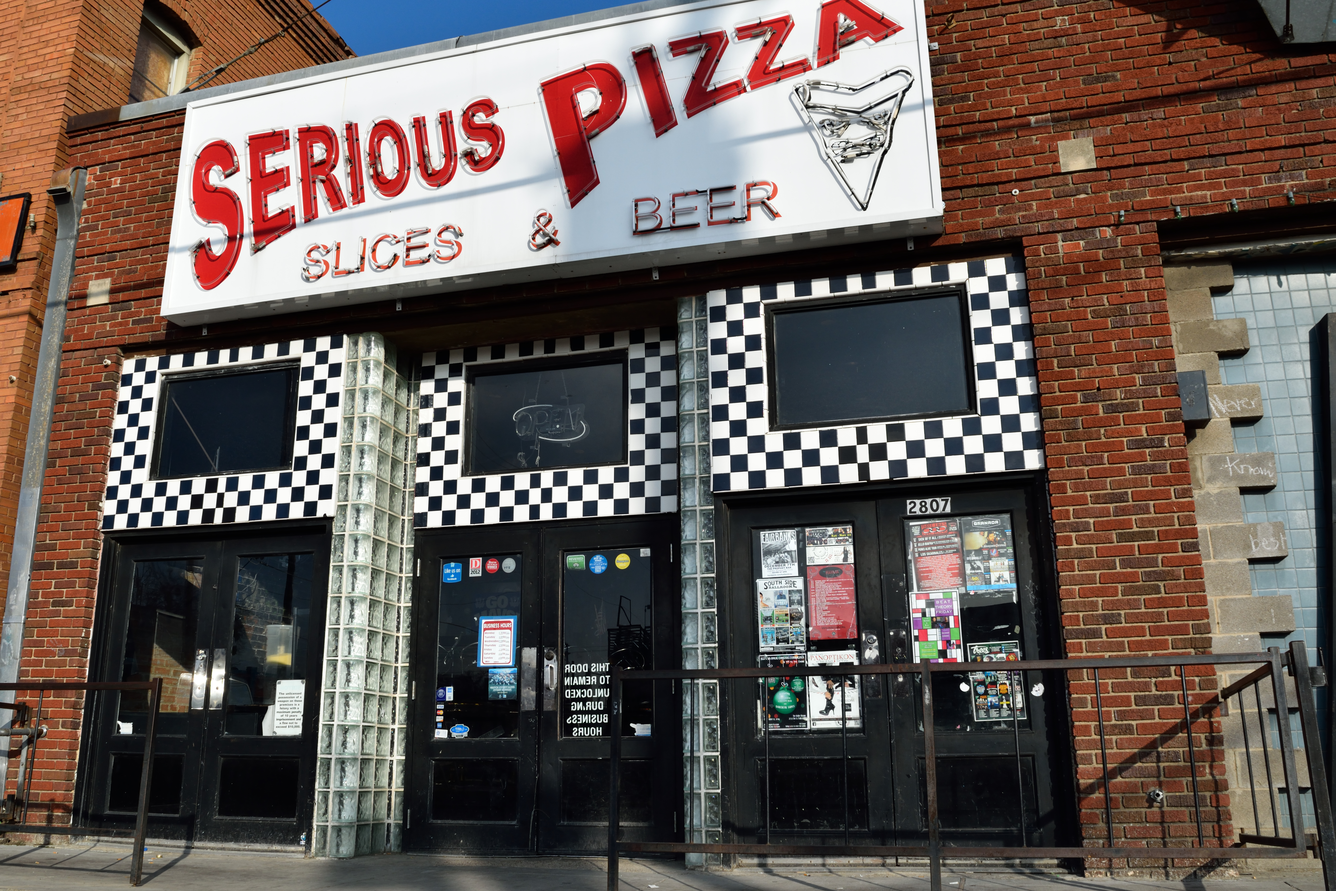 The storefront for Serious Pizza, a late-night spot in Deep Ellum.