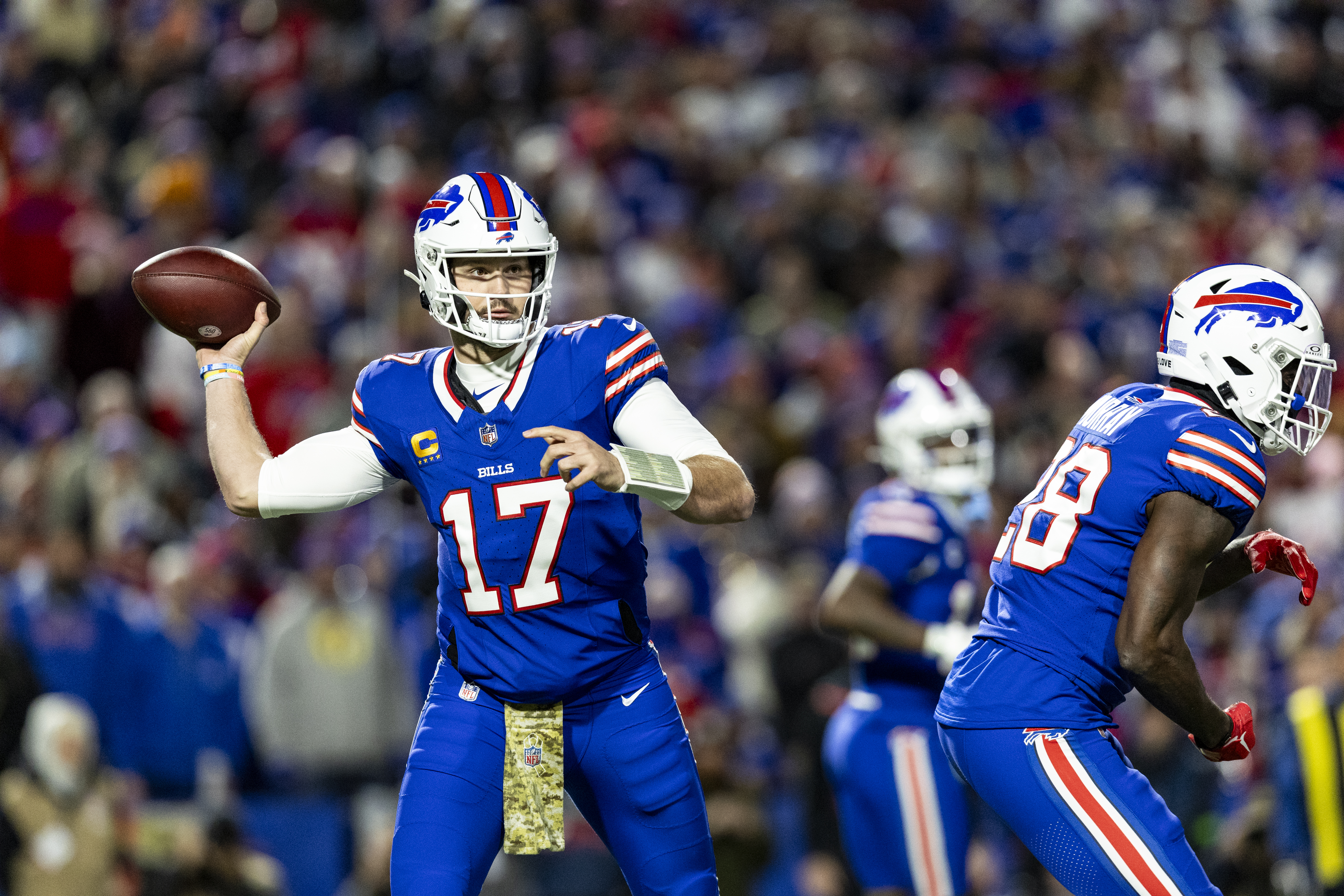 BUFFALO, NEW YORK - NOVEMBER 13: Josh Allen #17 of the Buffalo Bills throws a pass during the game against the Denver Broncos at Highmark Stadium on November 13, 2023 in Buffalo, New York. The Broncos beat the Bills 24-22.