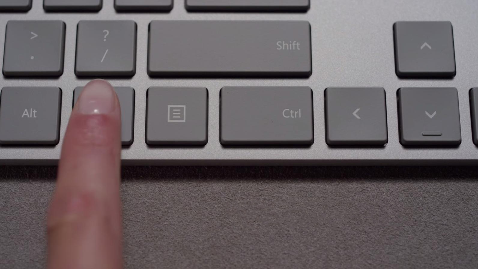 A finger on a Microsoft keyboard