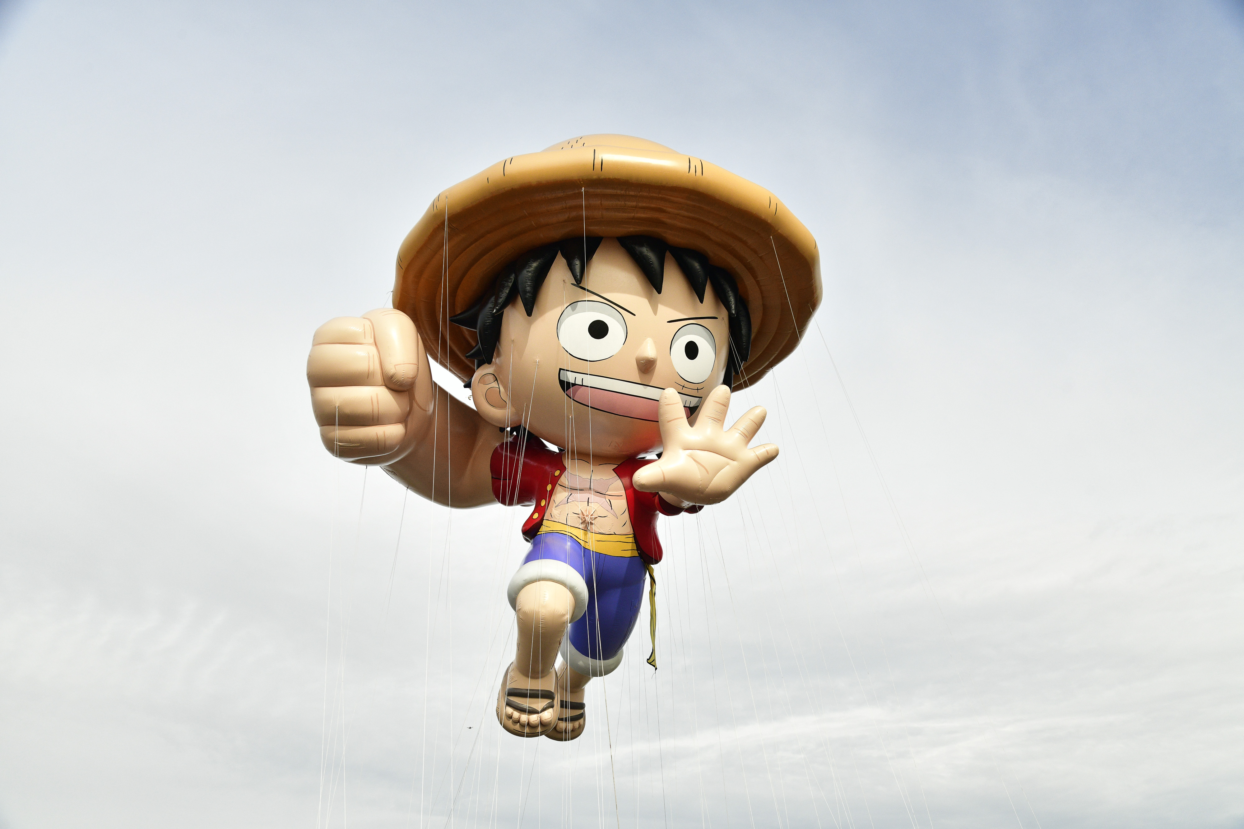 Luffy D. Monkey as a Thanksgiving parade balloon floating in the sky