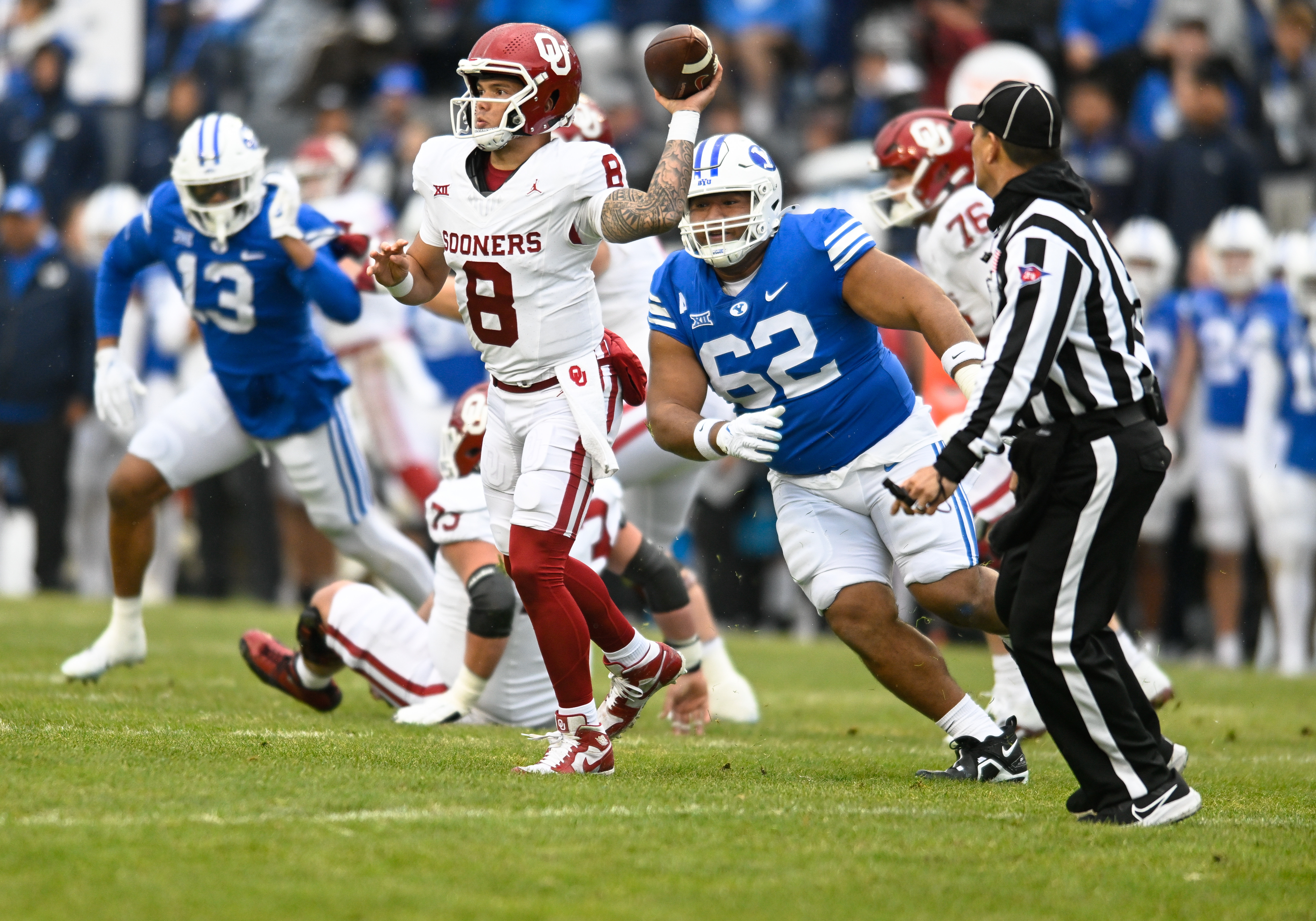 Oklahoma Sooners quarterback Dillon Gabriel makes a pass during a college football game between the Oklahoma Sooners and the BYU Cougars on November 18, 2023 at LaVell Edwards Stadium in Provo, Utah.