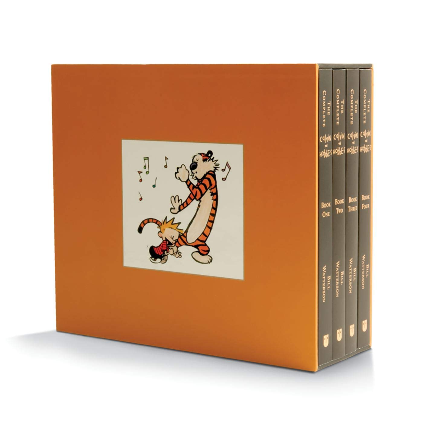 A handsome box set of the complete Calvin and Hobbes catoons, in an orange box, with four books with dark spines