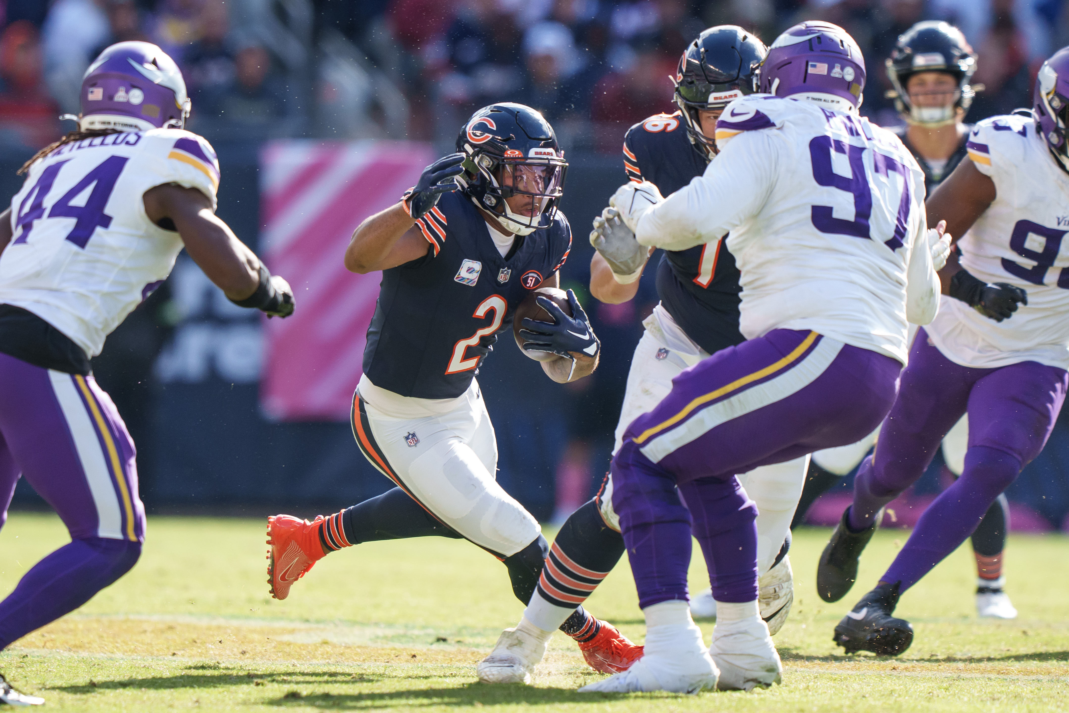 Wide receiver DJ Moore of the Chicago Bears runs the ball during the second half of an NFL football game against the Minnesota Vikings at Soldier Field on October 15, 2023 in Chicago, Illinois.