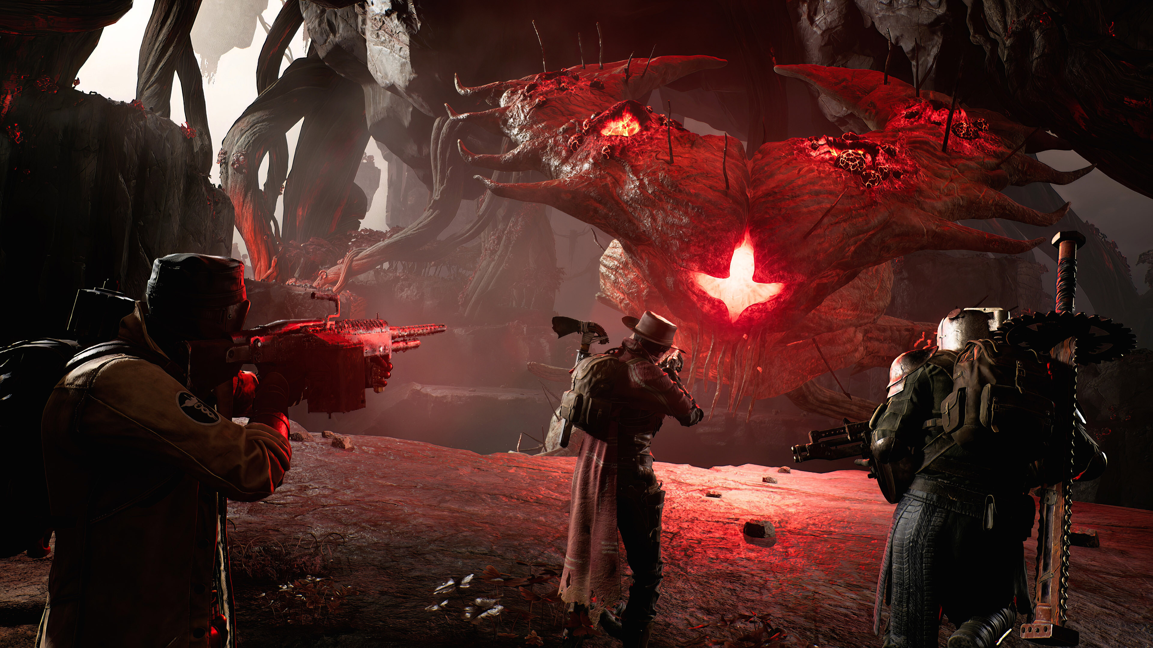 Three characters battle a giant eldritch horror in a screenshot from Remnant 2