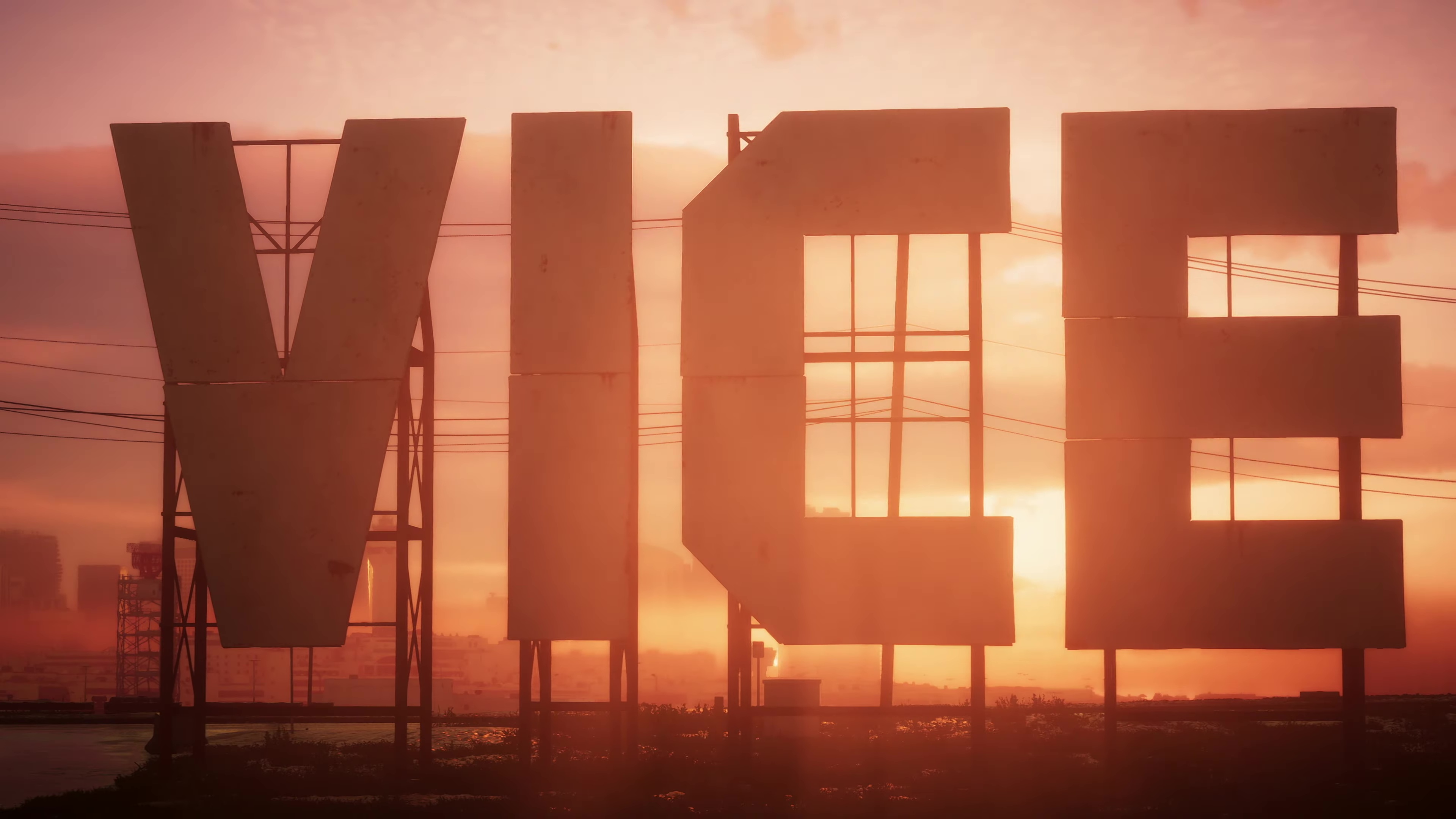 The sun sets behind a sign reading “Vice” in a screenshot for GTA 6.