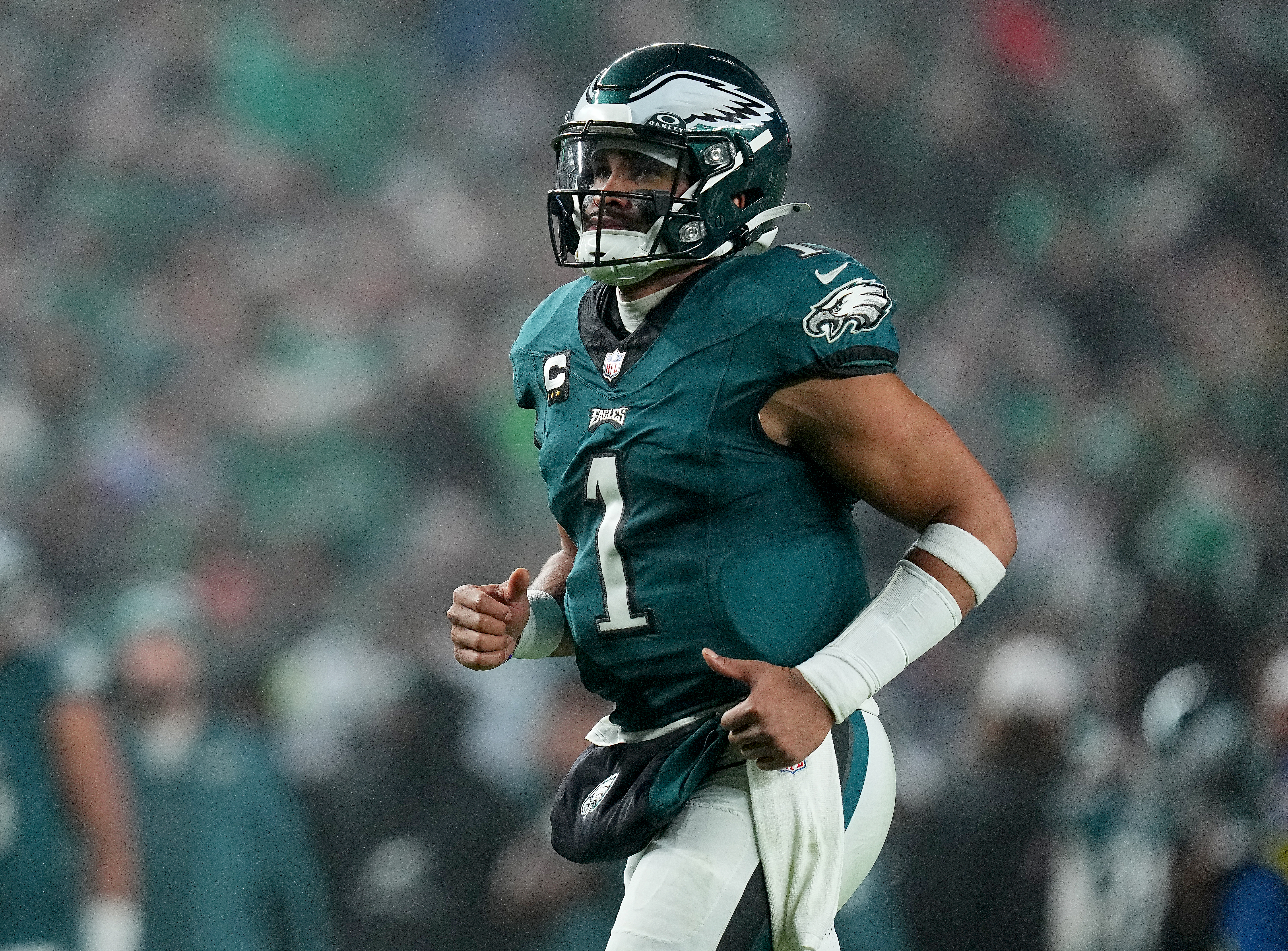 PHILADELPHIA, PENNSYLVANIA - DECEMBER 03: Jalen Hurts #1 of the Philadelphia Eagles runs off the field at halftime in the game against the San Francisco 49ers at Lincoln Financial Field on December 03, 2023 in Philadelphia, Pennsylvania.