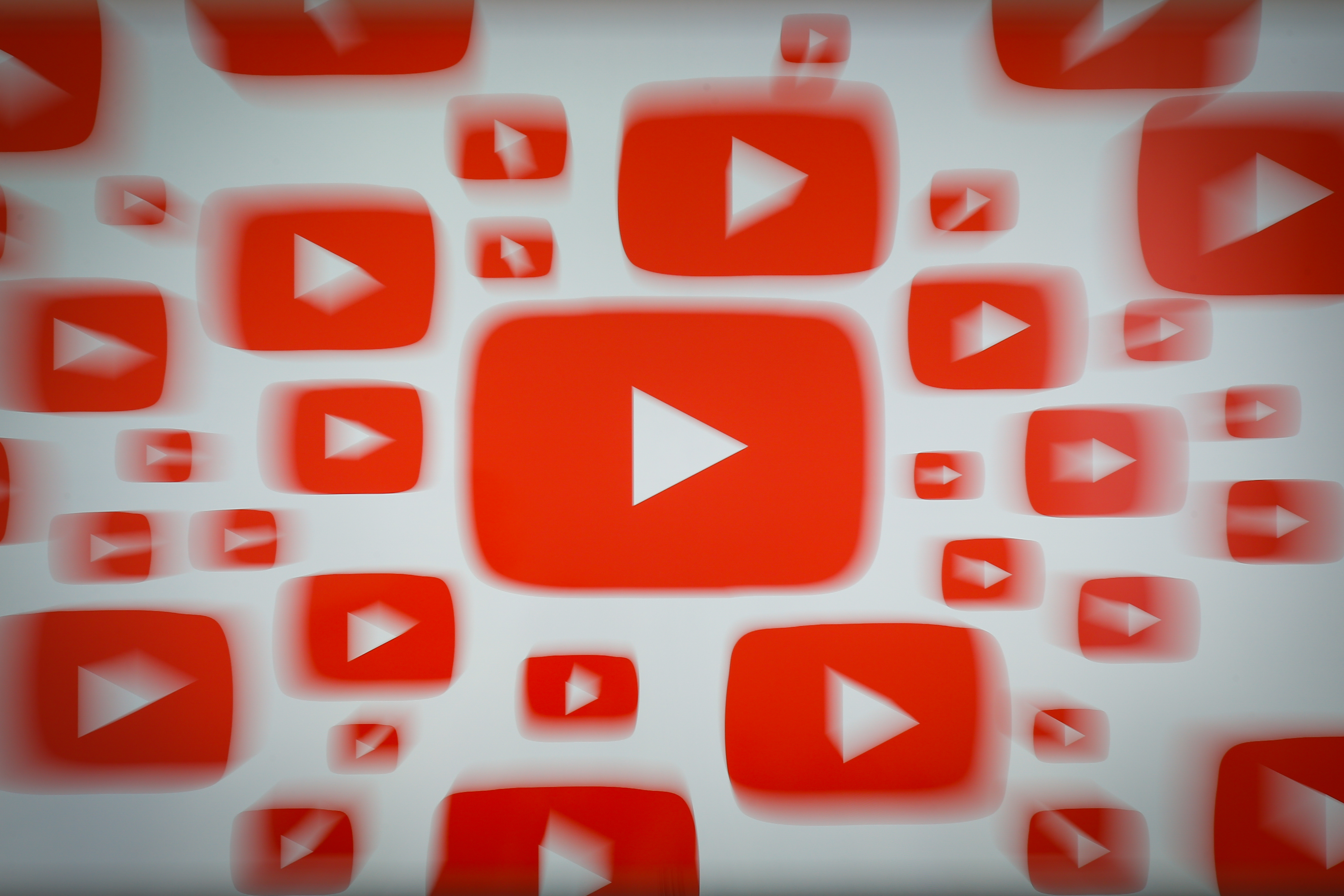 Several red and white YouTube “play” button logos.