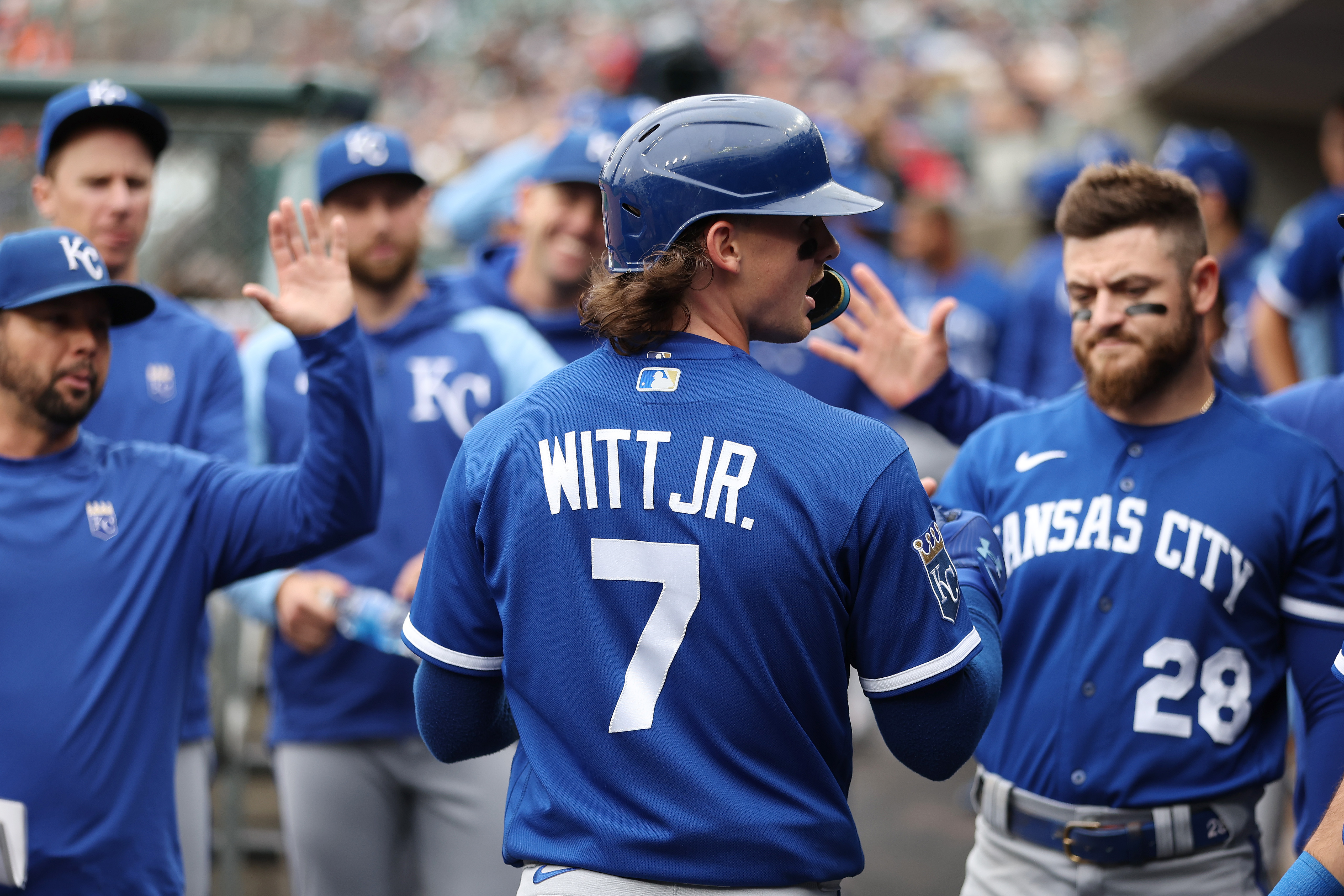Bobby Witt Jr. #7 of the Kansas City Royals celebrates scoring a first inning run with teammates while playing the Detroit Tigers at Comerica Park on September 28, 2023 in Detroit, Michigan.