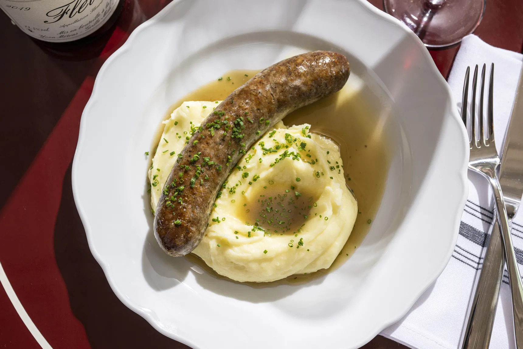 A dish with sausage and potatoes at Libertine.