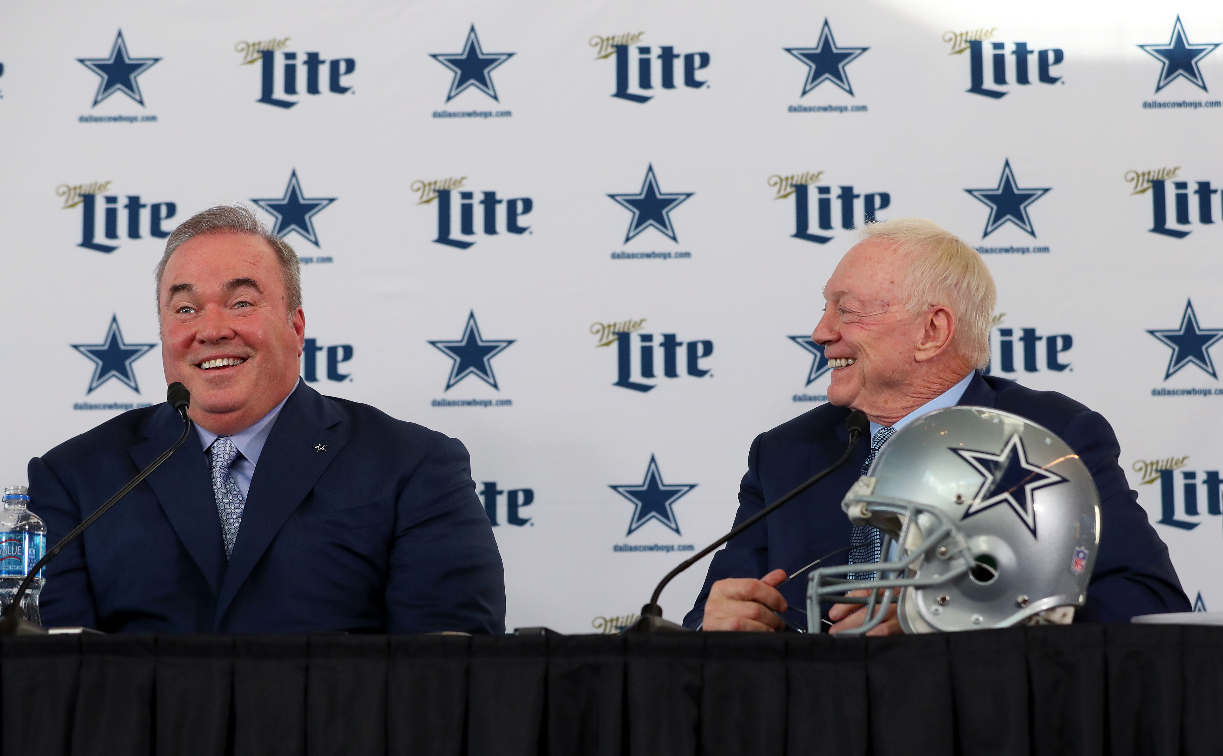 Head coach Mike McCarthy of the Dallas Cowboys and Dallas Cowboys owner Jerry Jones talk with the media during a press conference at the Ford Center at The Star on January 08, 2020 in Frisco, Texas.