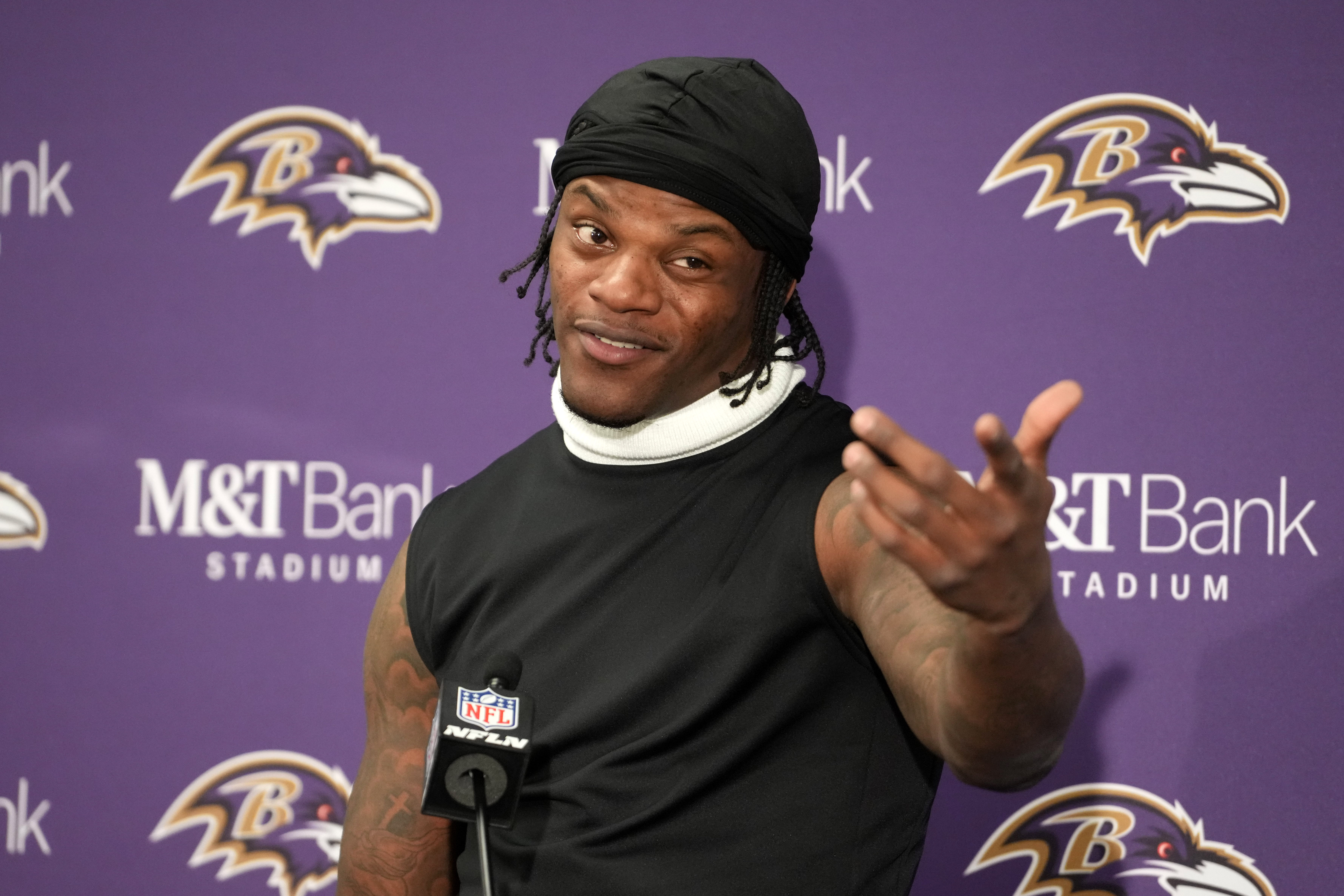 Quarterback Lamar Jackson #8 of the Baltimore Ravens speaks during the press conference after the AFC Divisional Playoff game against the Houston Texans at M&amp;T Bank Stadium on January 20, 2024 in Baltimore, Maryland. The Ravens defeated the Texans 34-10.