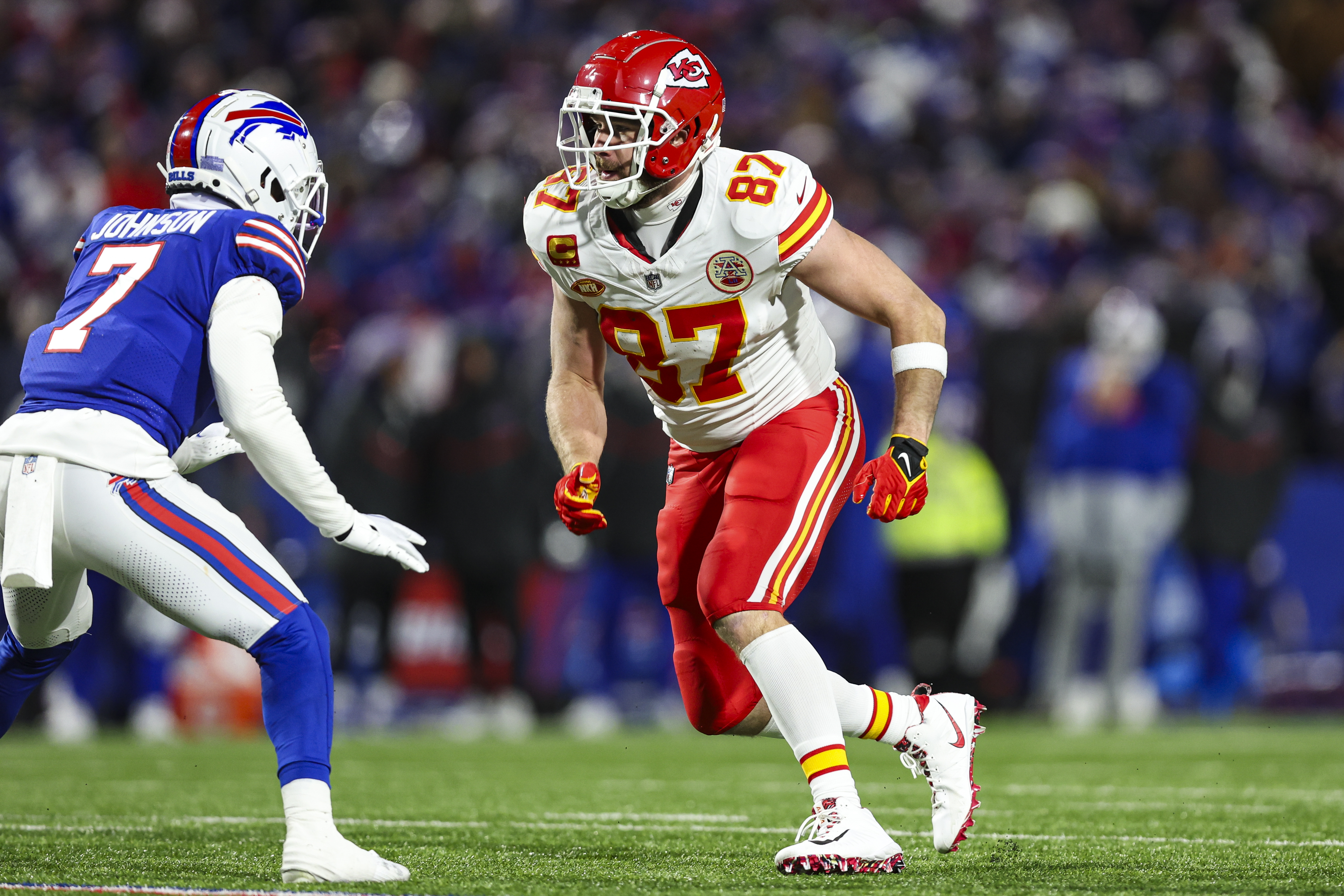 Travis Kelce of the Kansas City Chiefs runs a route during an NFL divisional round playoff football game against the Buffalo Bills at Highmark Stadium on January 21, 2024 in Orchard Park, New York.