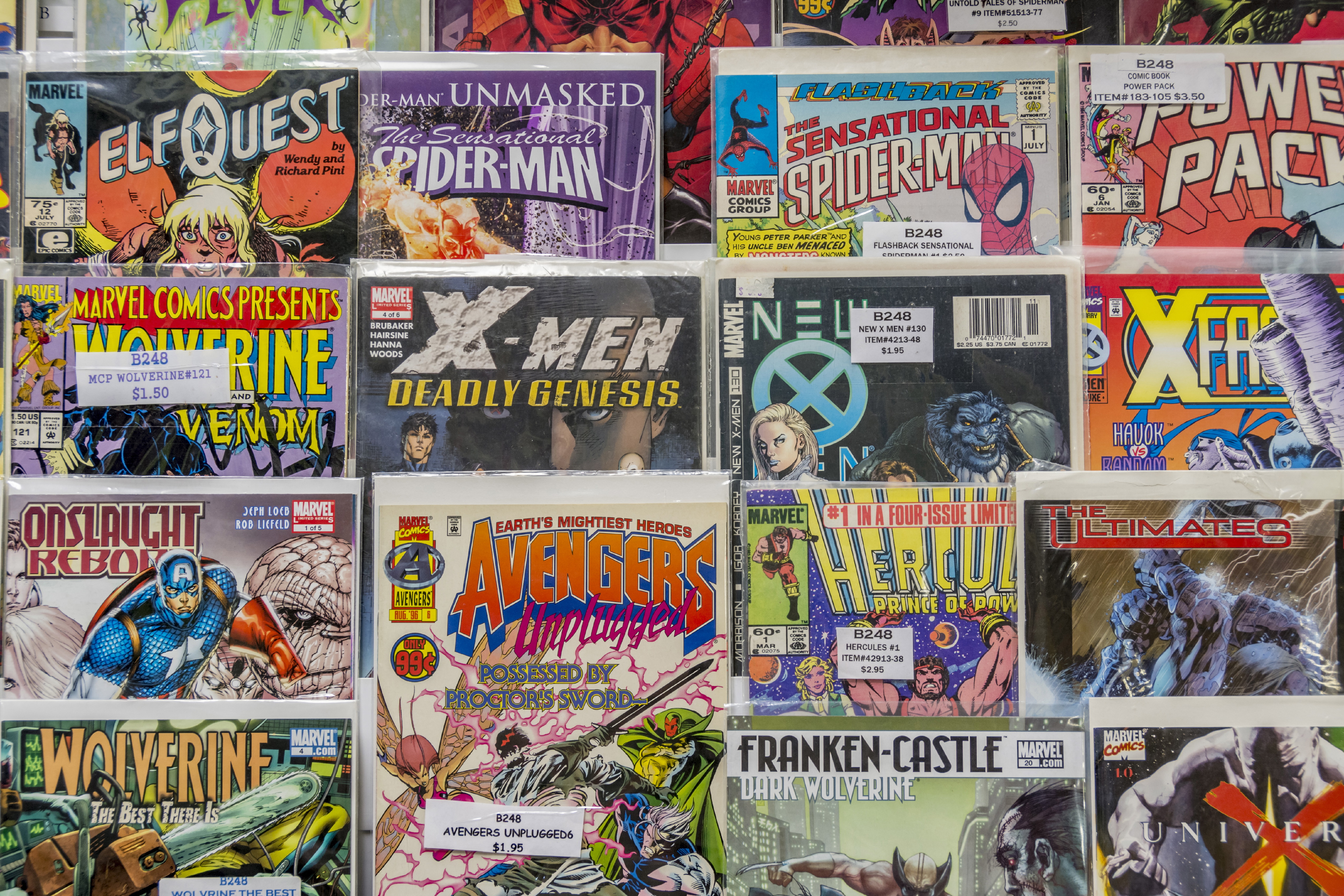 Rack of comic books for sale at a flea market