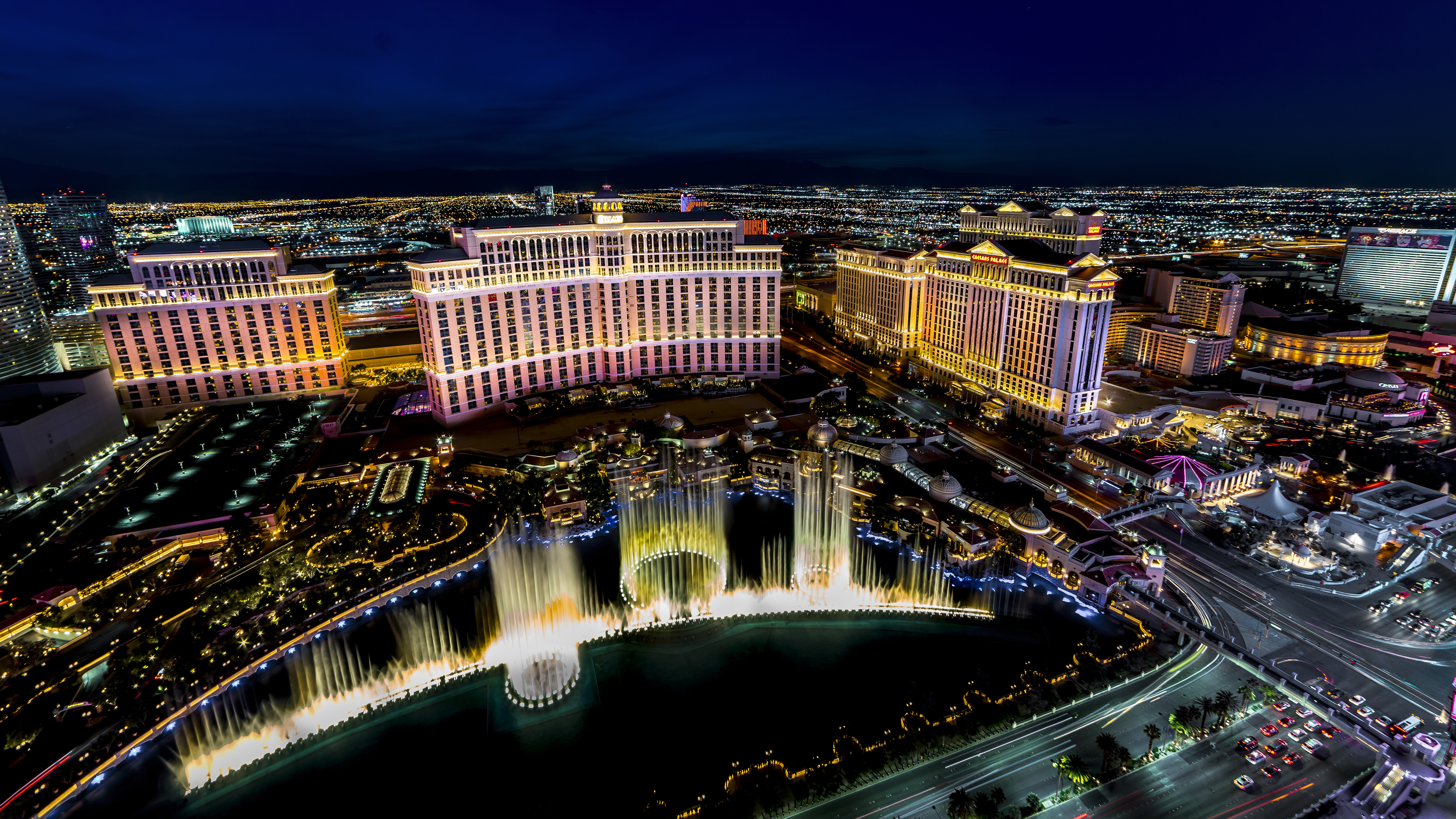 Panoramic View of Las Vegas Nevada at night with neon from Paris Eifel Tower view spot