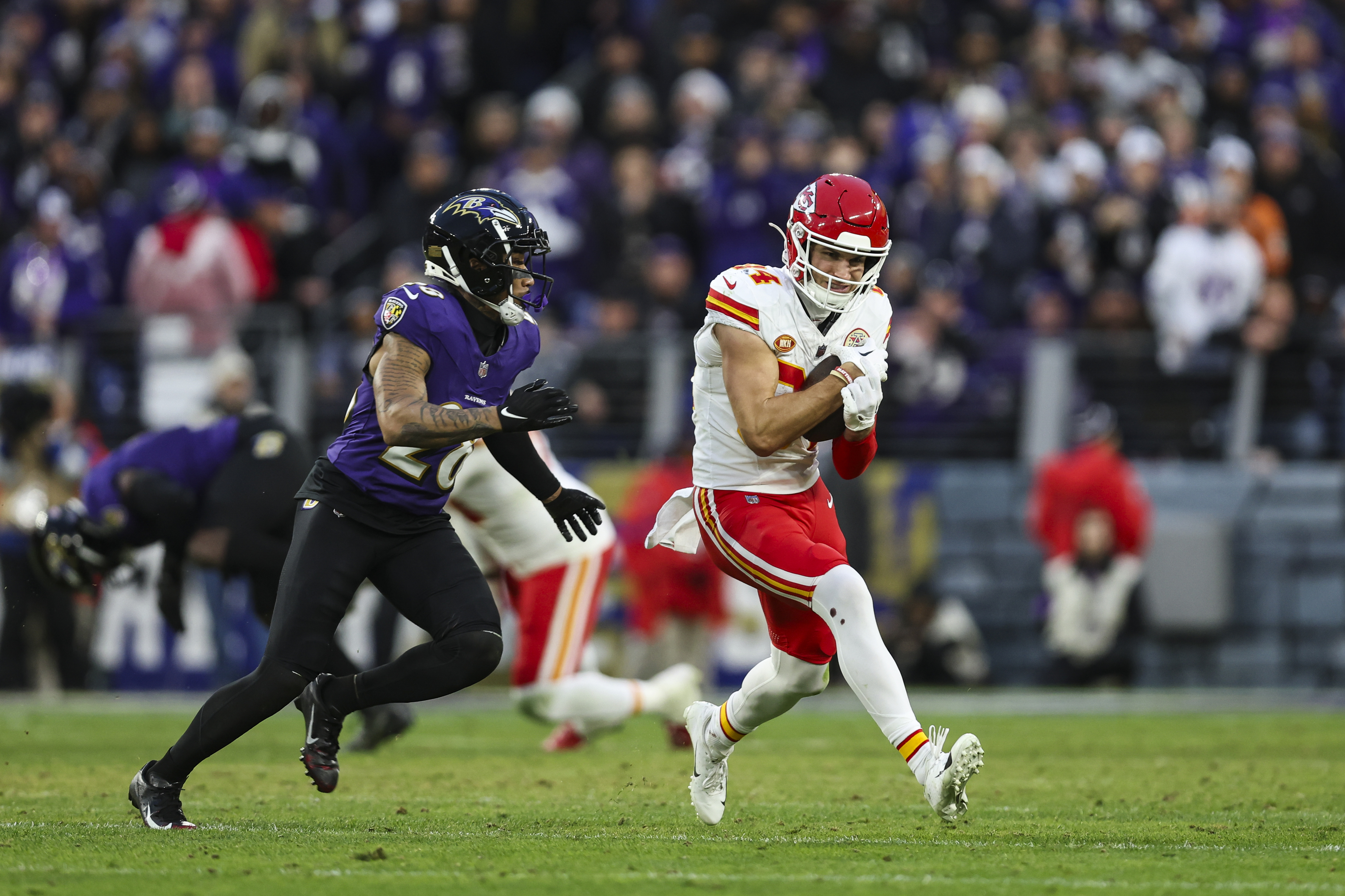 Justin Watson of the Kansas City Chiefs runs the ball during the AFC Championship NFL football game against the Baltimore Ravens at M&amp;T Bank Stadium on January 28, 2024 in Baltimore, Maryland.