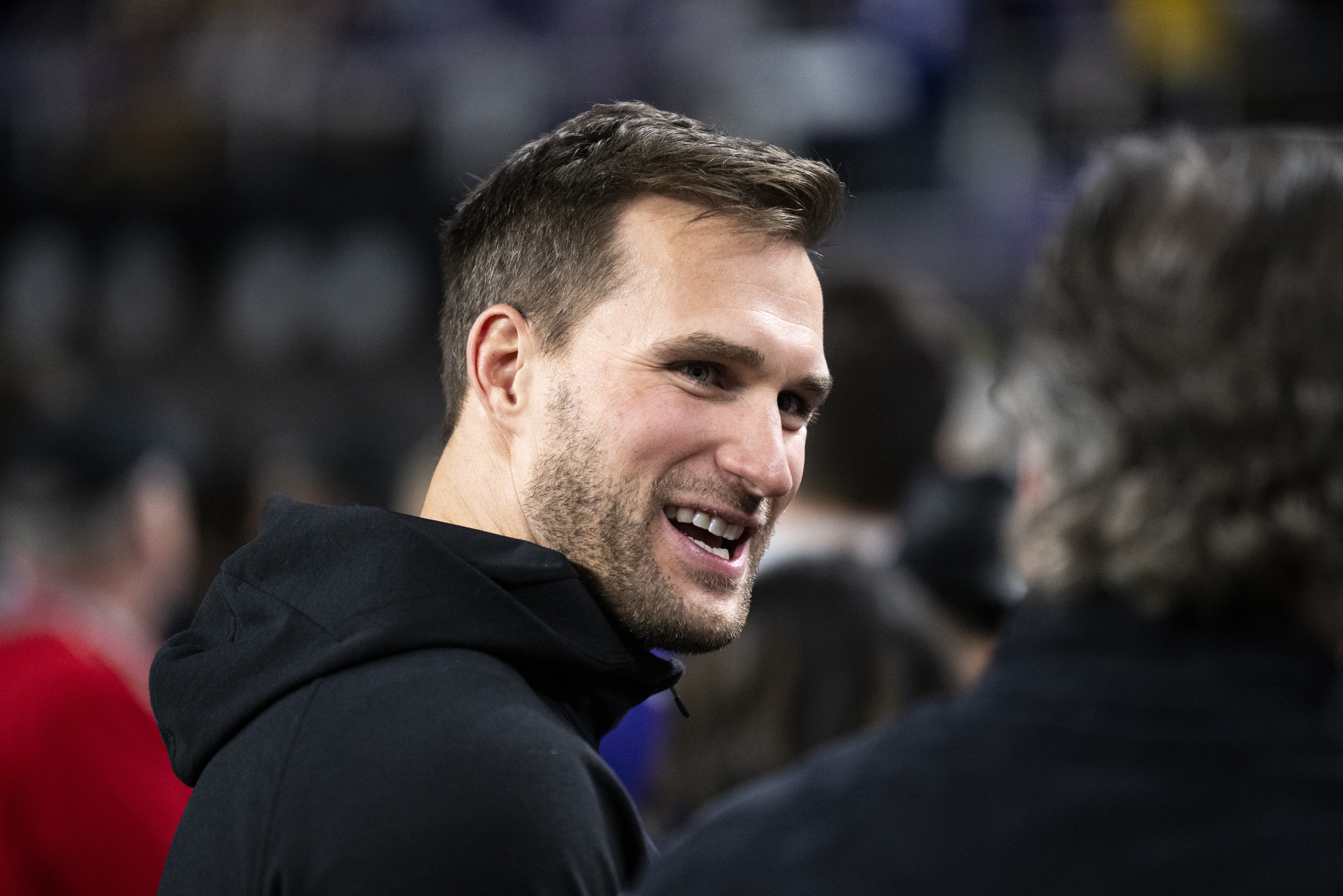Kirk Cousins #8 of the Minnesota Vikings looks on from the sidelines before the game against the Green Bay Packers at U.S. Bank Stadium on December 31, 2023 in Minneapolis, Minnesota.