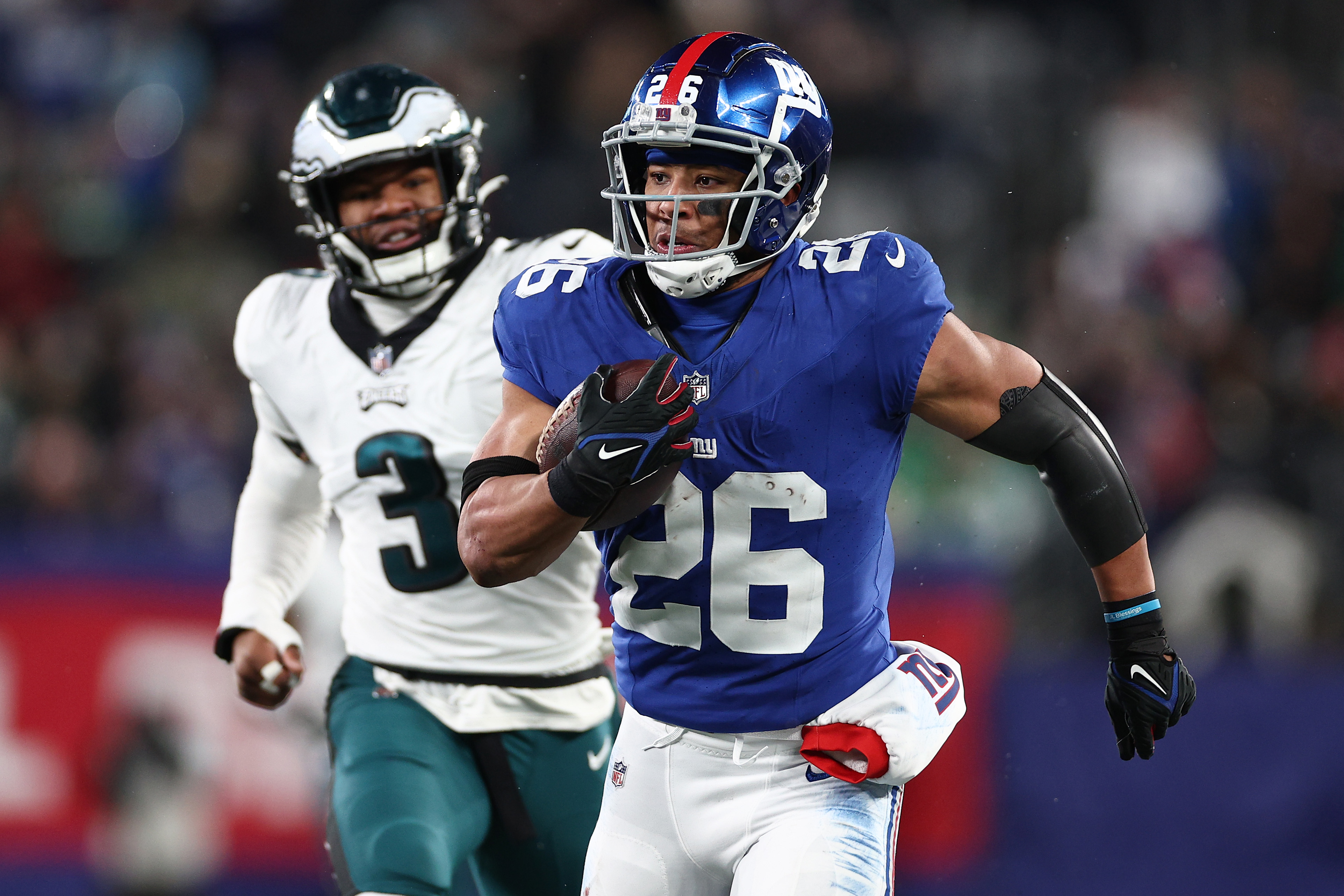 Saquon Barkley of the New York Giants runs the ball after a catch during the second quarter in the game against the Philadelphia Eagles at MetLife Stadium on January 07, 2024 in East Rutherford, New Jersey.