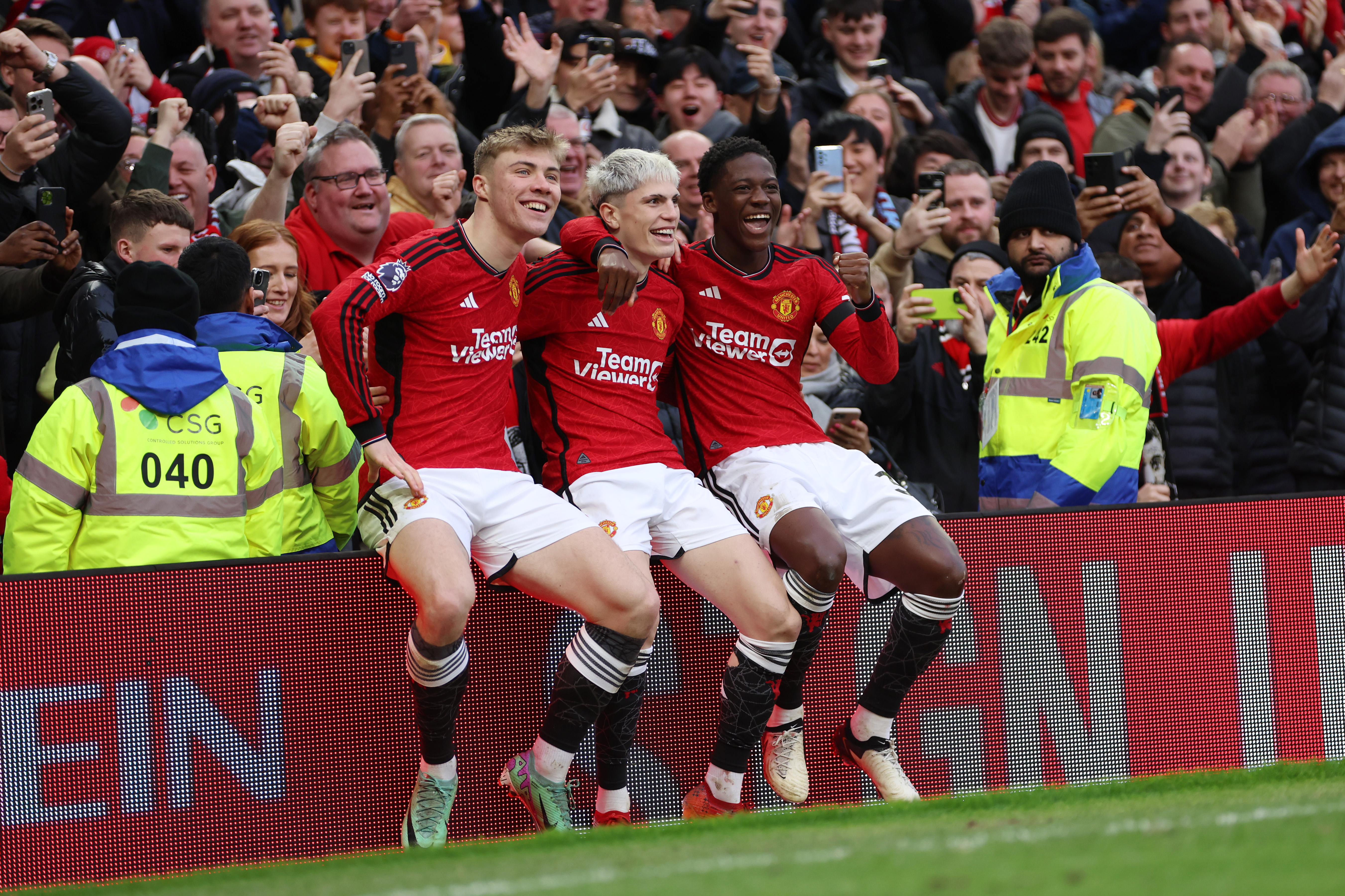 Alejandro Garnacho celebrates with Rasmus Hojlund and Kobbie Mainoo - Manchester United - Premier League