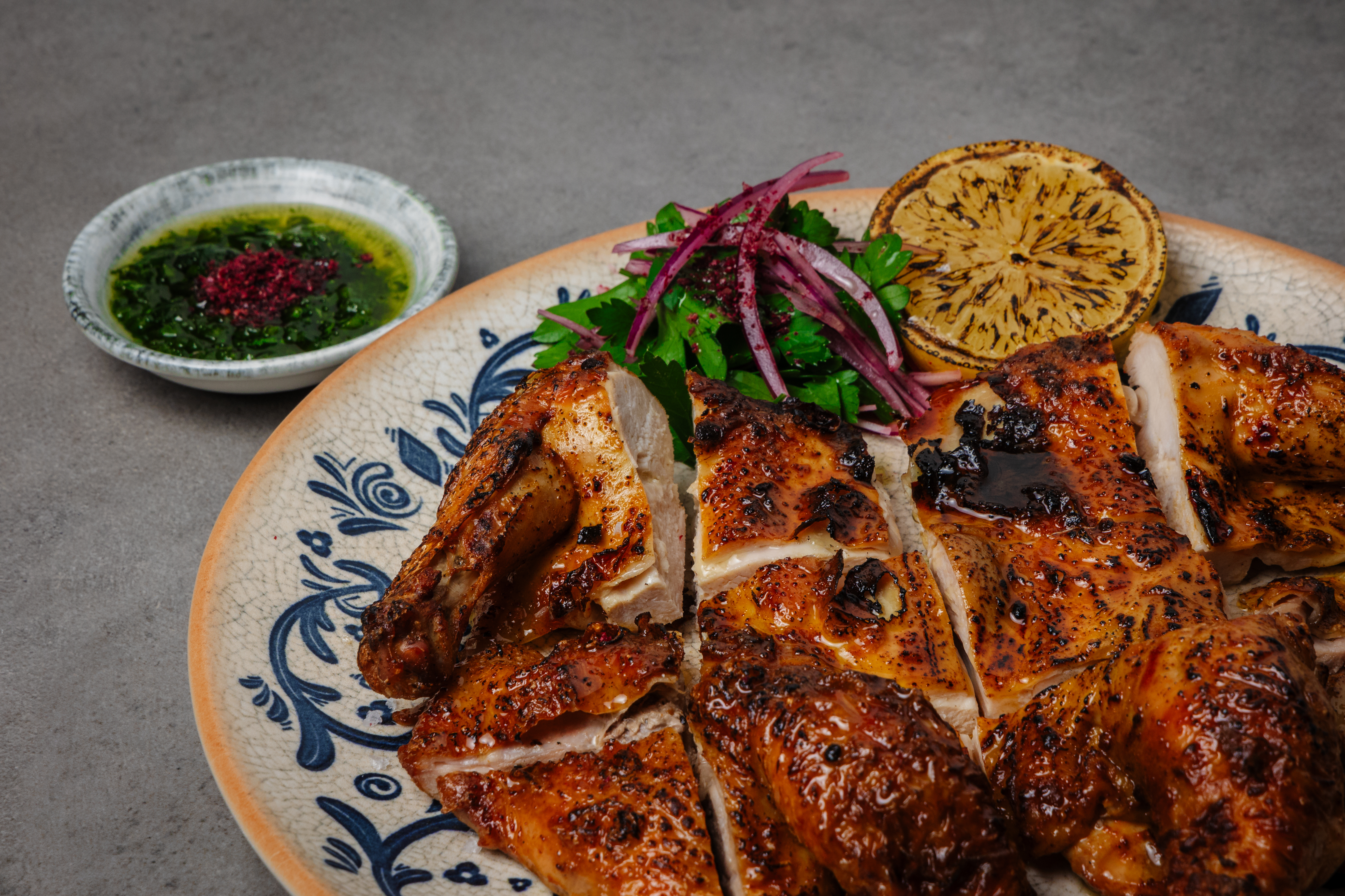 Wood-roasted&nbsp;Aleppo-marinated chicken from Kor.