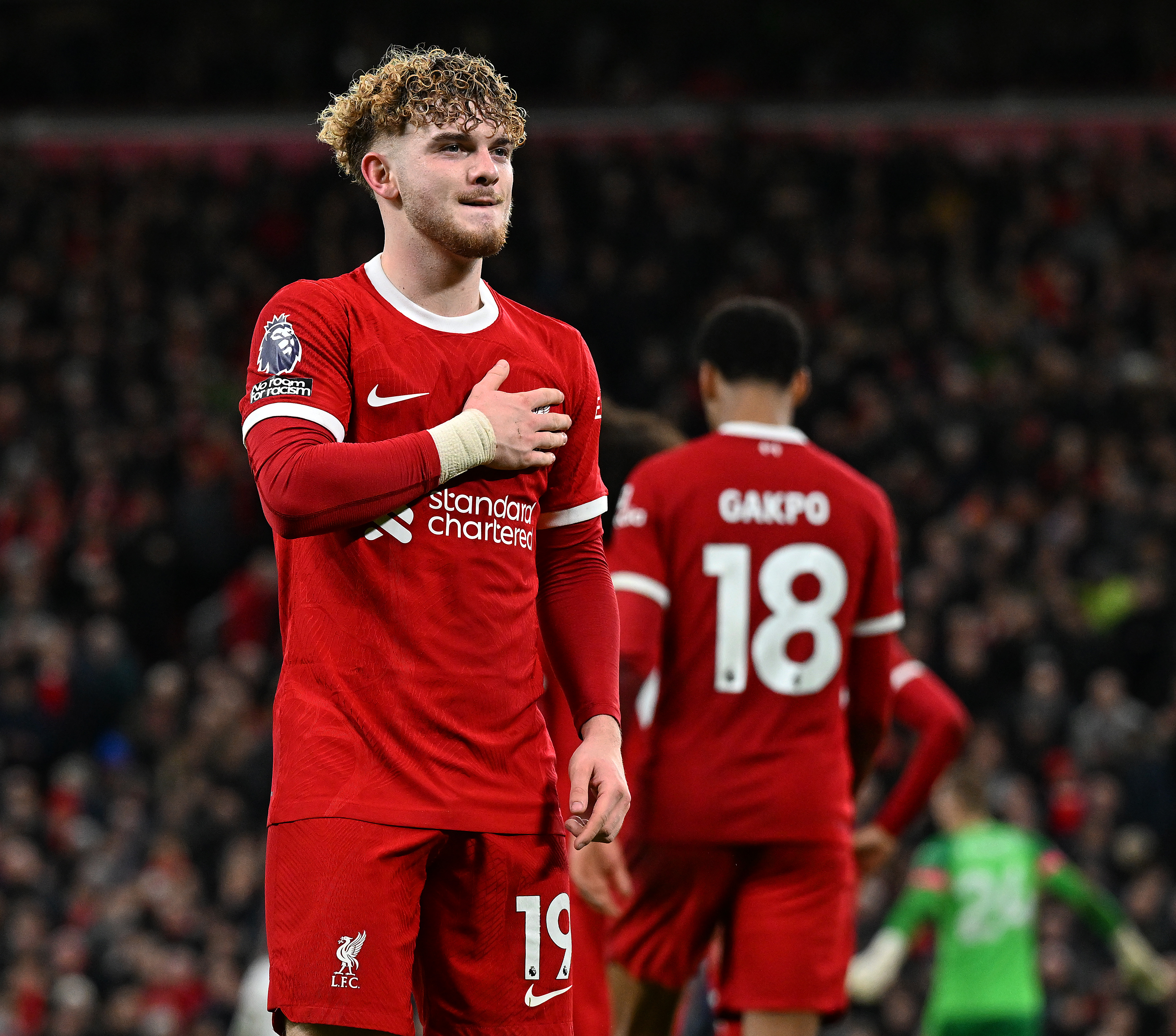 Harvey Elliott of Liverpool celebrates after scoring the fourth Liverpool goal during the Premier League match between Liverpool FC and Luton Town at Anfield on February 21, 2024 in Liverpool, England.