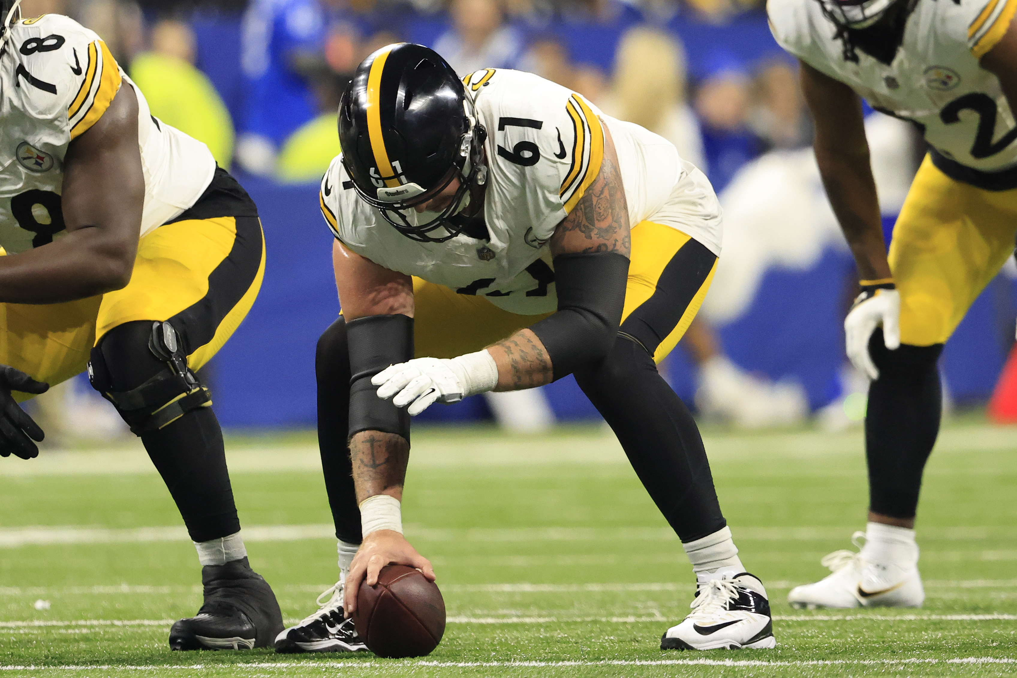 Mason Cole #61 of the Pittsburgh Steelers prepares to snap the ball in the game against the Indianapolis Colts at Lucas Oil Stadium on December 16, 2023 in Indianapolis, Indiana.