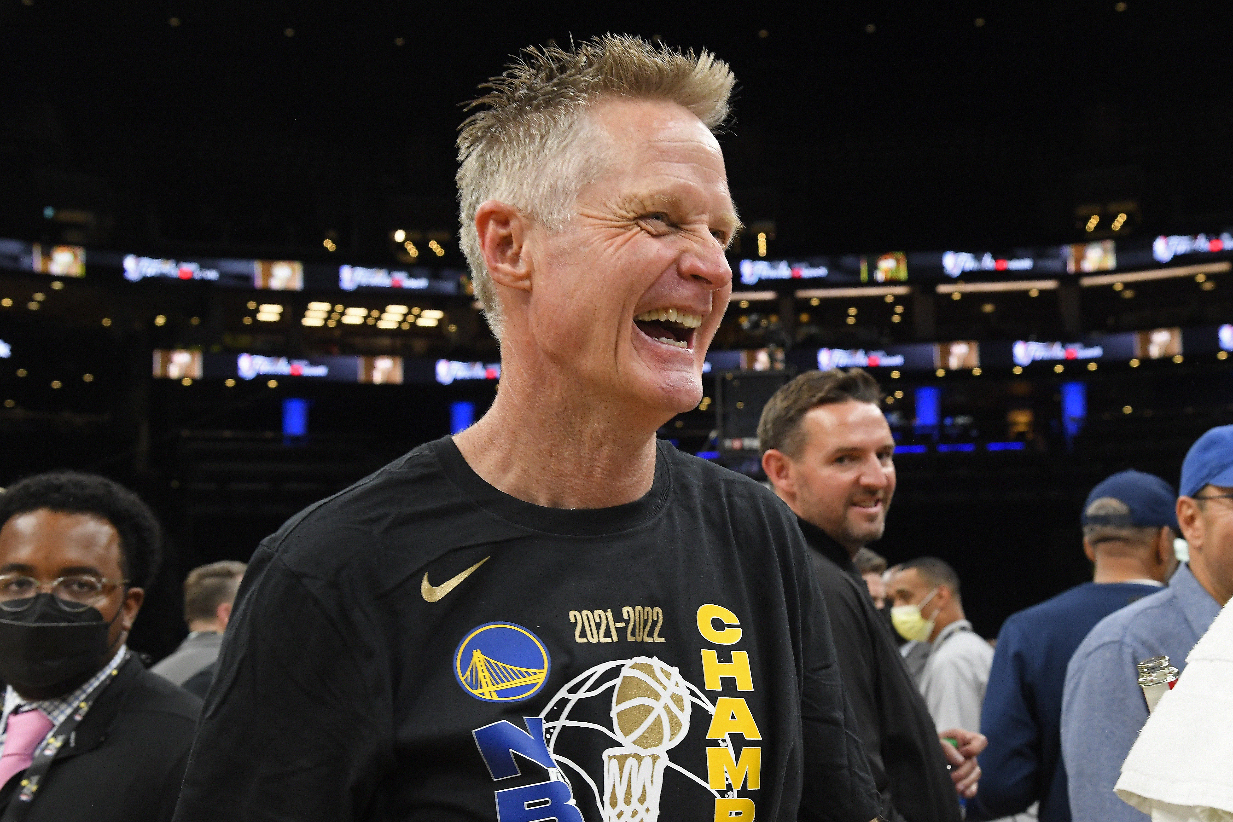 Steve Kerr smiling and celebrating after the 2022 championship.