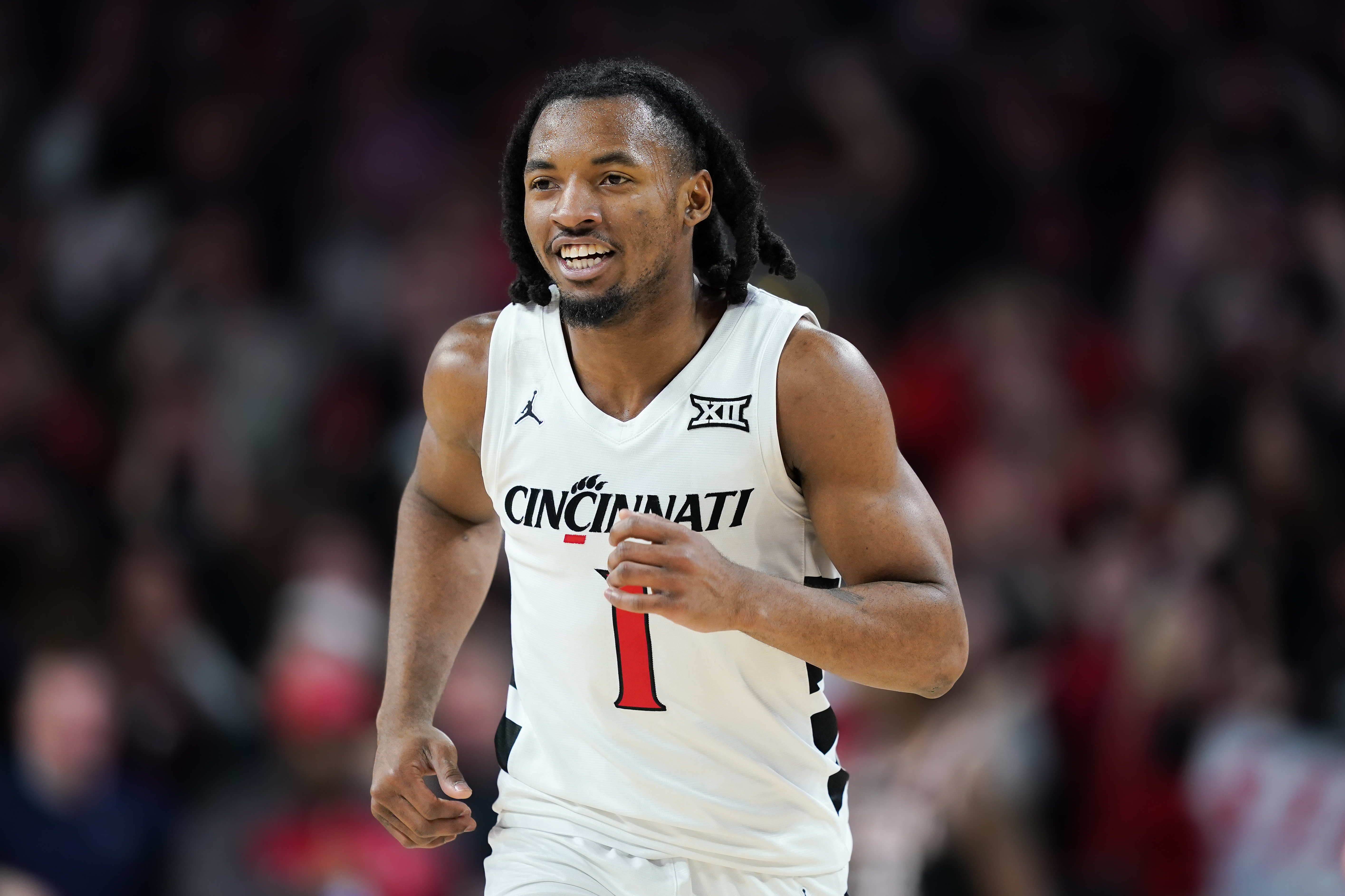 Day Day Thomas of the Cincinnati Bearcats jogs across the court in the second half against the Oklahoma State Cowboys at Fifth Third Arena on February 21, 2024 in Cincinnati, Ohio.