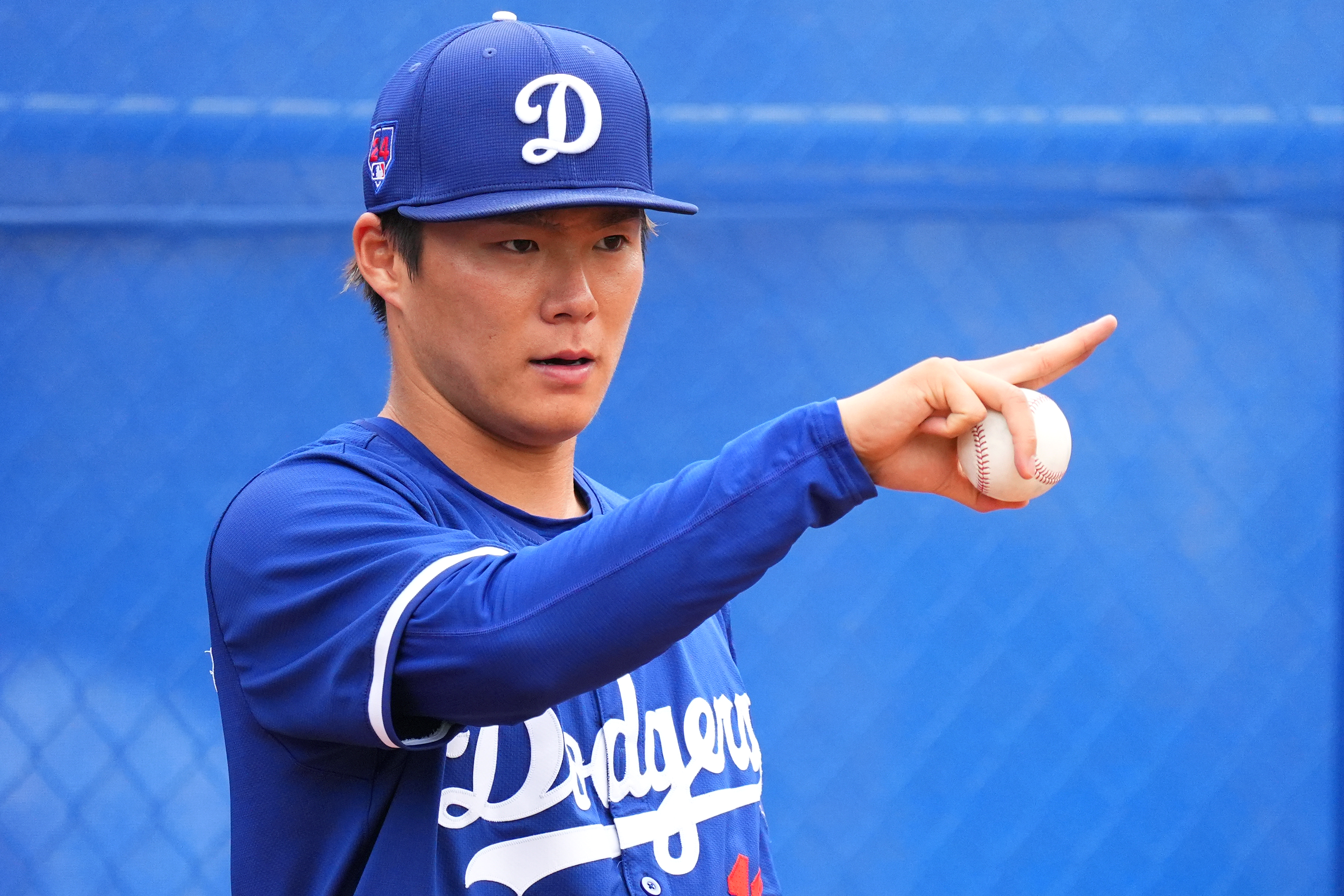 Yoshinobu Yamamoto of the Los Angeles Dodgers pitches in the bullpen during a spring training session at Camelback Ranch on February 26, 2024 in Glendale, Arizona.