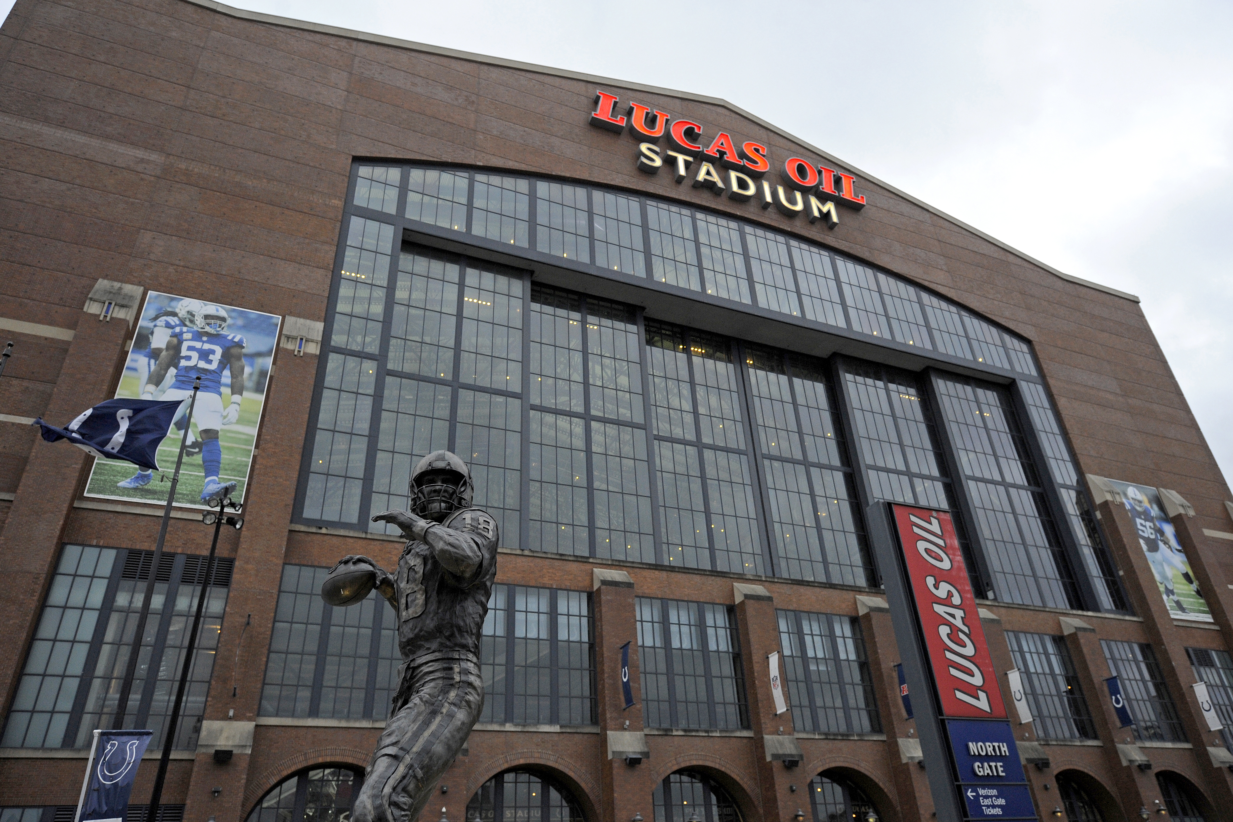 A statue of Peyton Manning stands outside of the stadium before the start of the NFL football game between the New England Patriots and the Indianapolis Colts on December 18, 2021, at Lucas Oil Stadium in Indianapolis, Indiana.