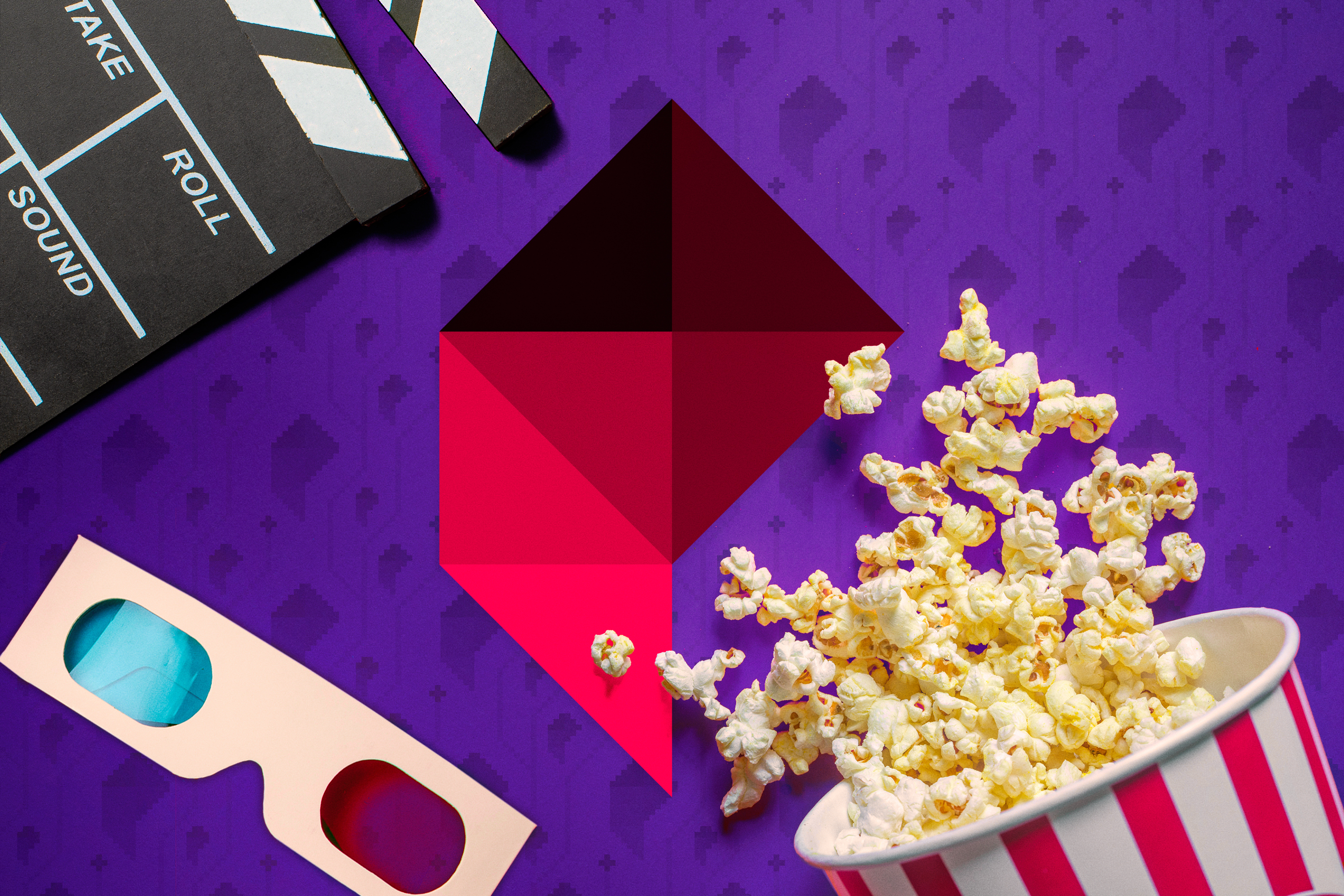 A popcorn bucket next to a film clapper, 3D glasses, and the Polygon logo set against a purple background.