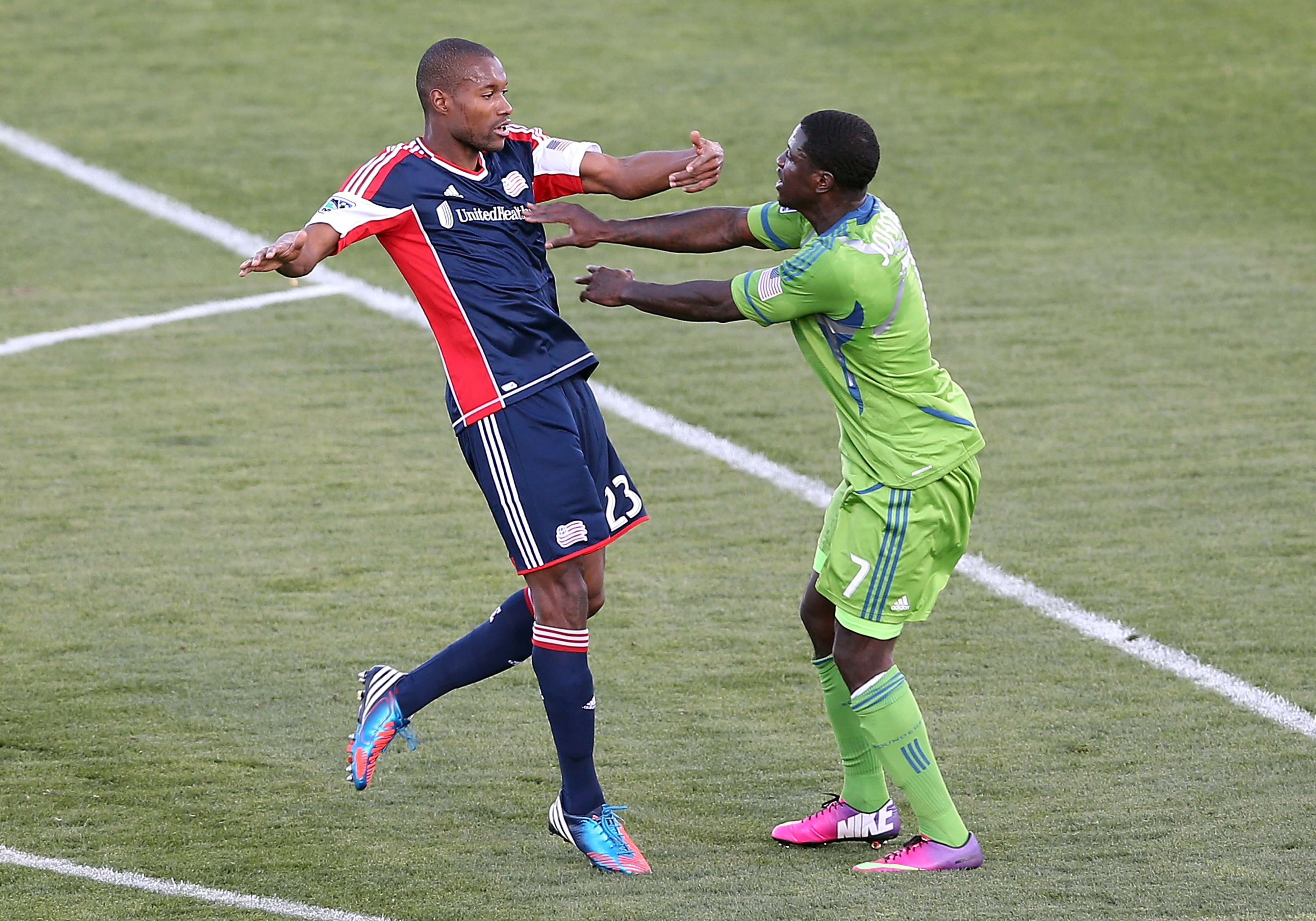 Eddie Johnson shoves Jose Goncalves in one of many first-half confrontations between players